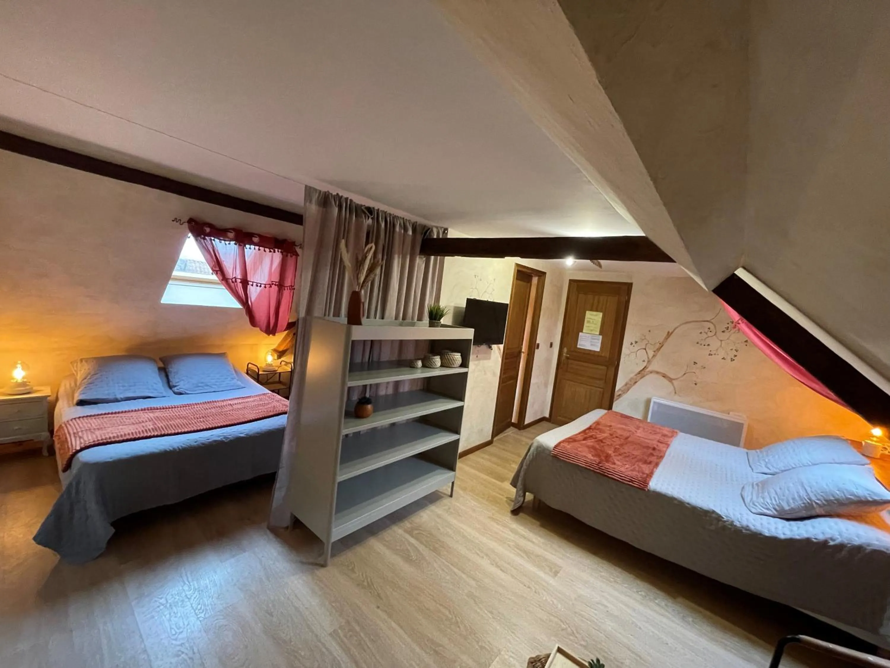 Bed in Chambres Du Marais