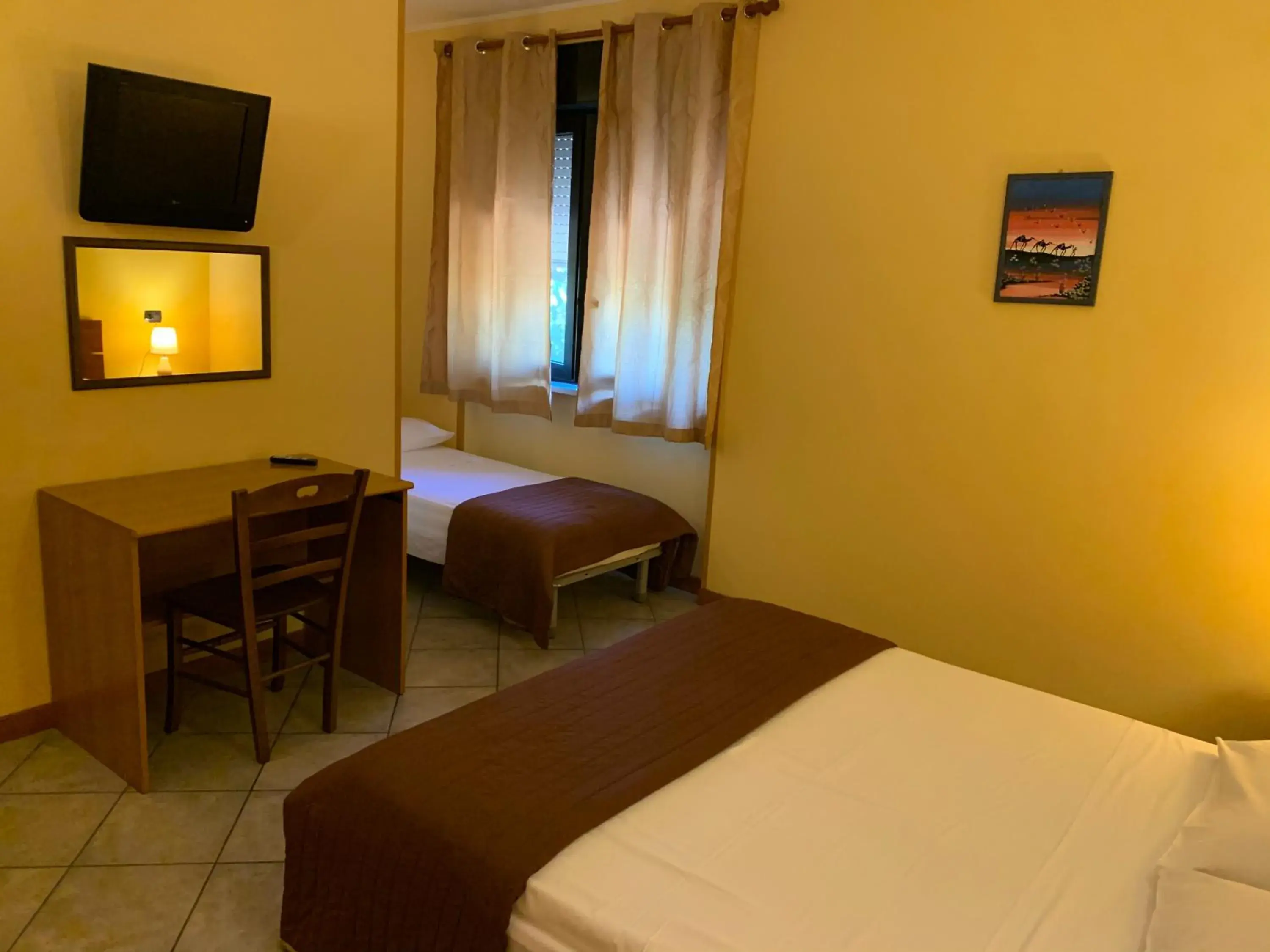 Triple Room in B&B Le Quercigliole Triple Room in B&B Le Quercigliole