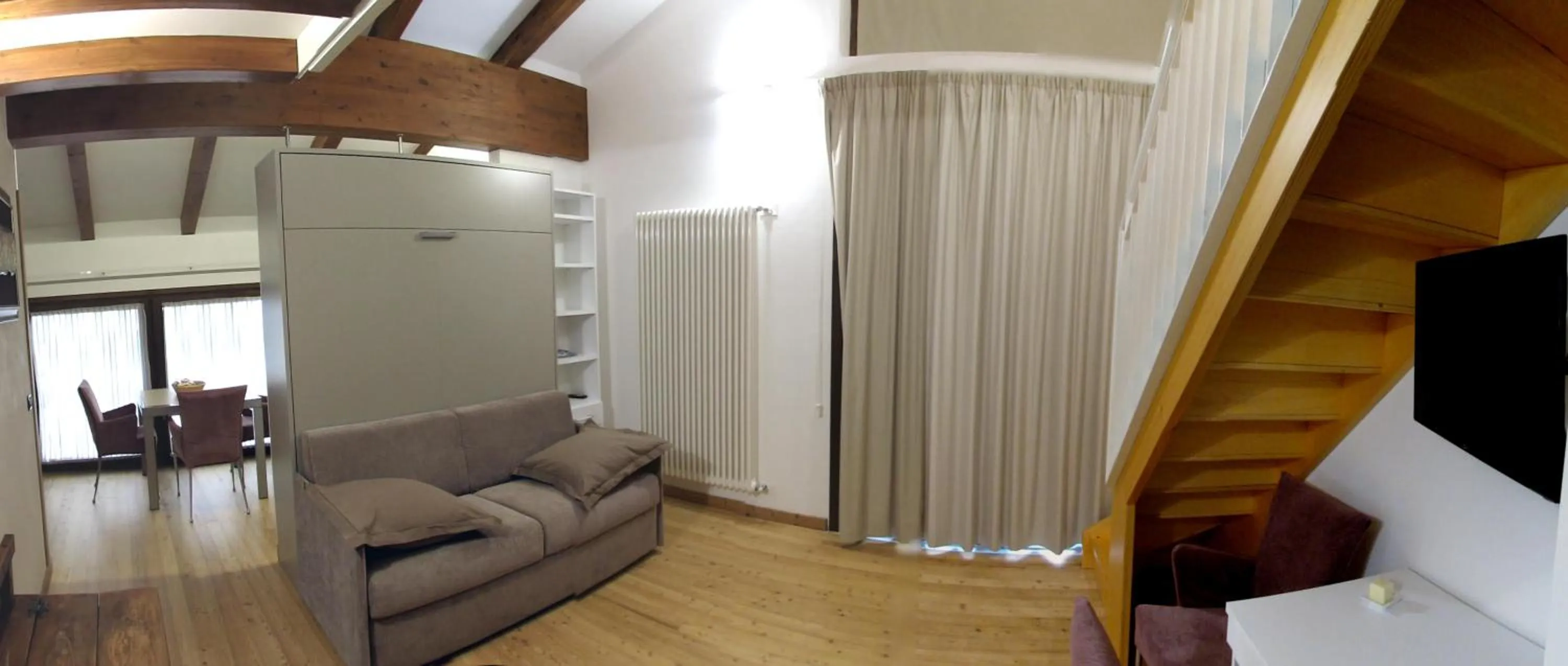 Living room in La Baita D'Oro Ristorante Residence