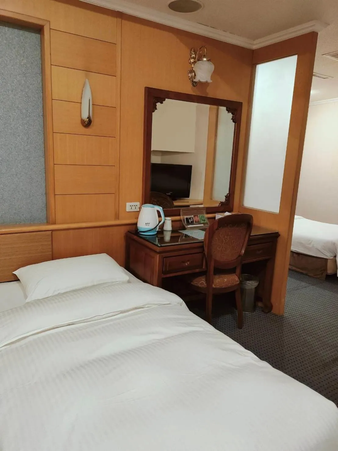 Bed in Champion Hotel