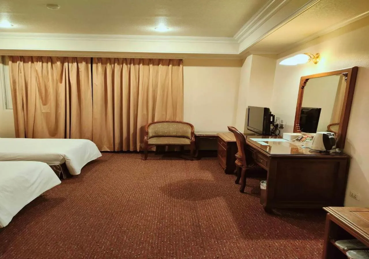 Bed in Champion Hotel