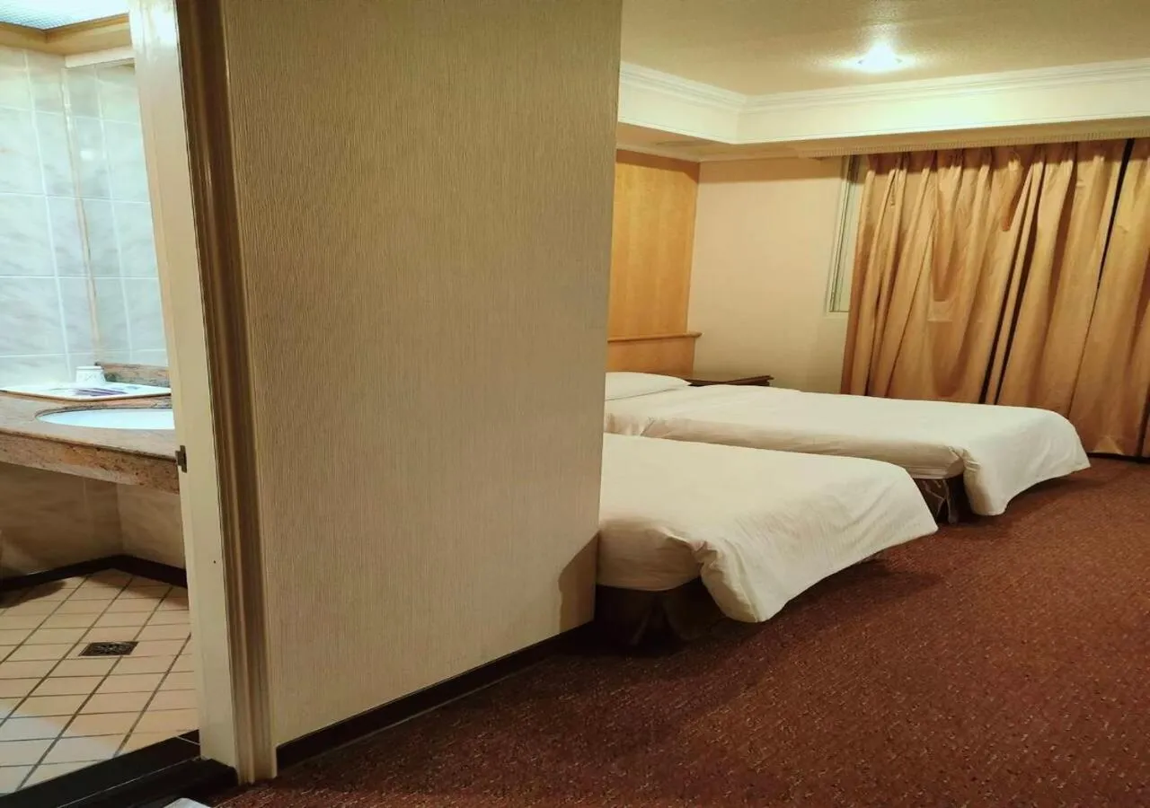 Bed in Champion Hotel