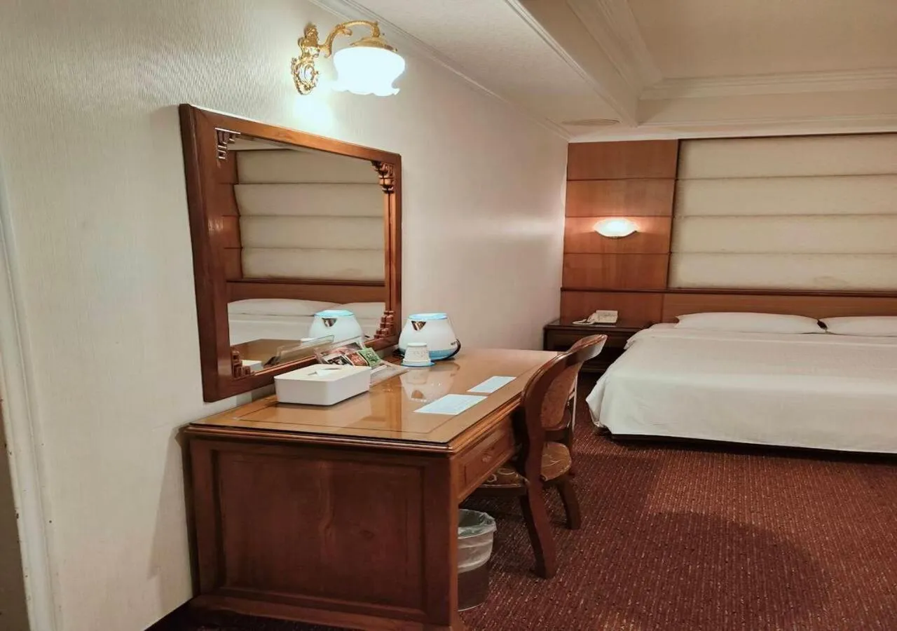 Bed in Champion Hotel