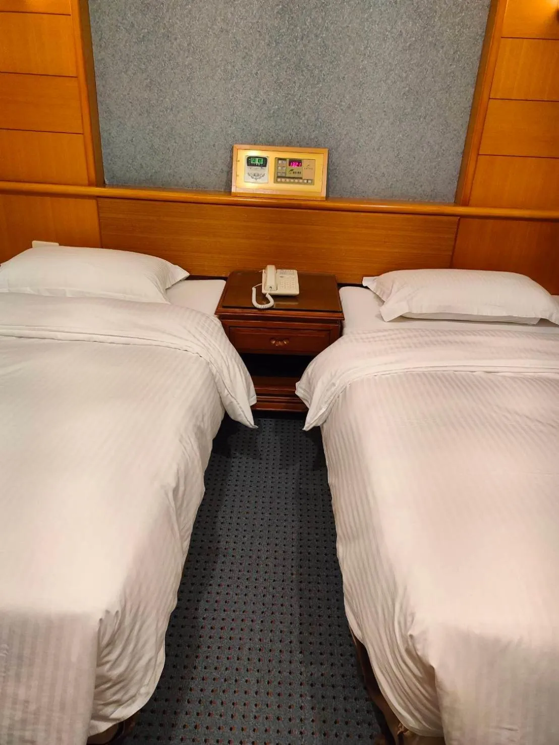 Bed in Champion Hotel
