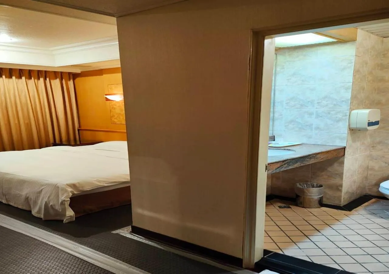 Bed in Champion Hotel