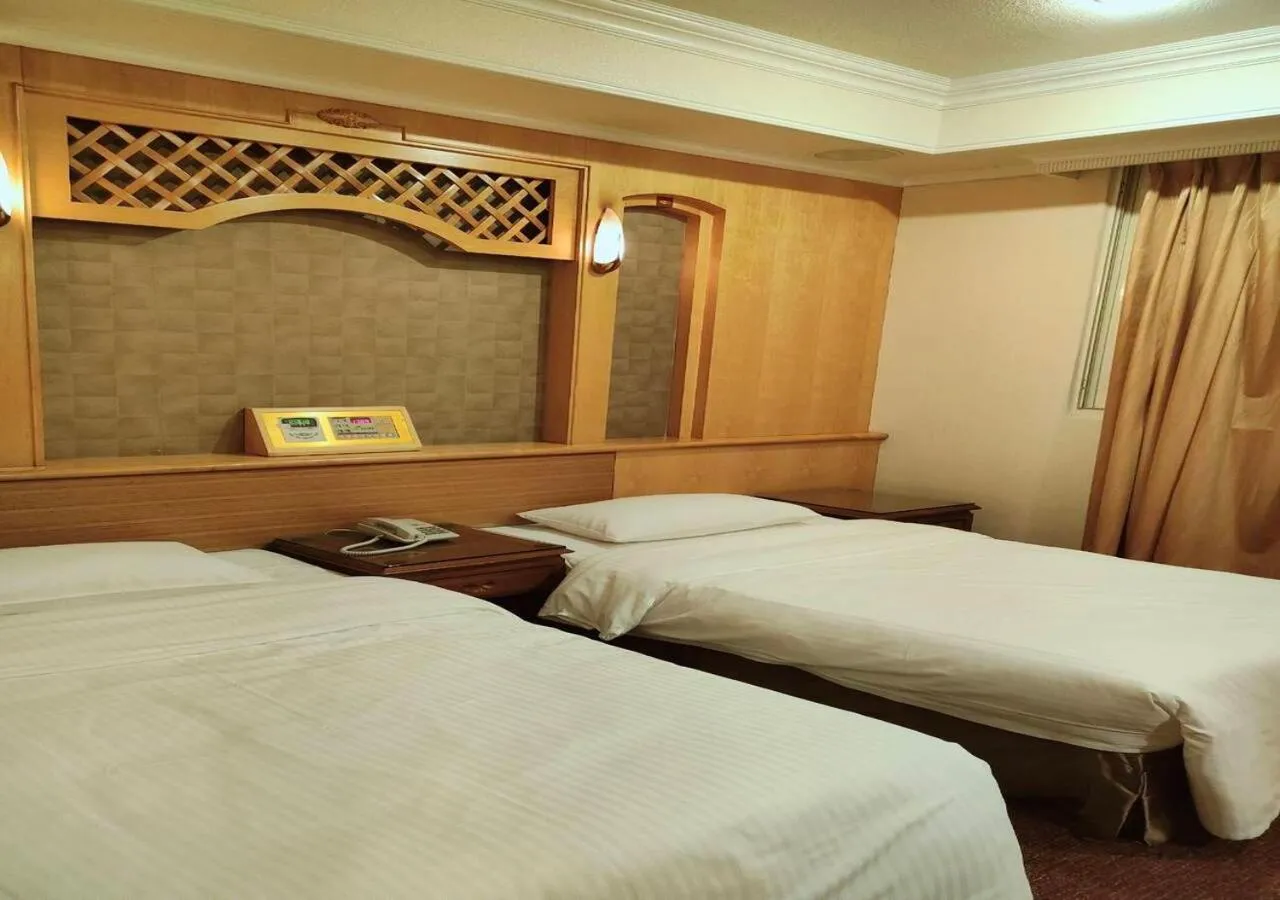 Bed in Champion Hotel