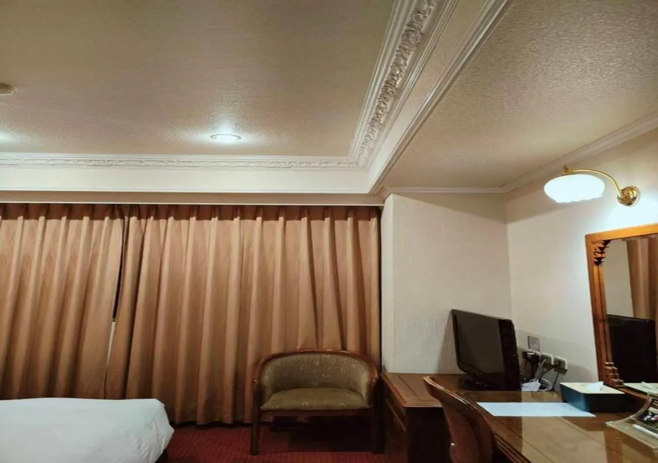 Bed in Champion Hotel