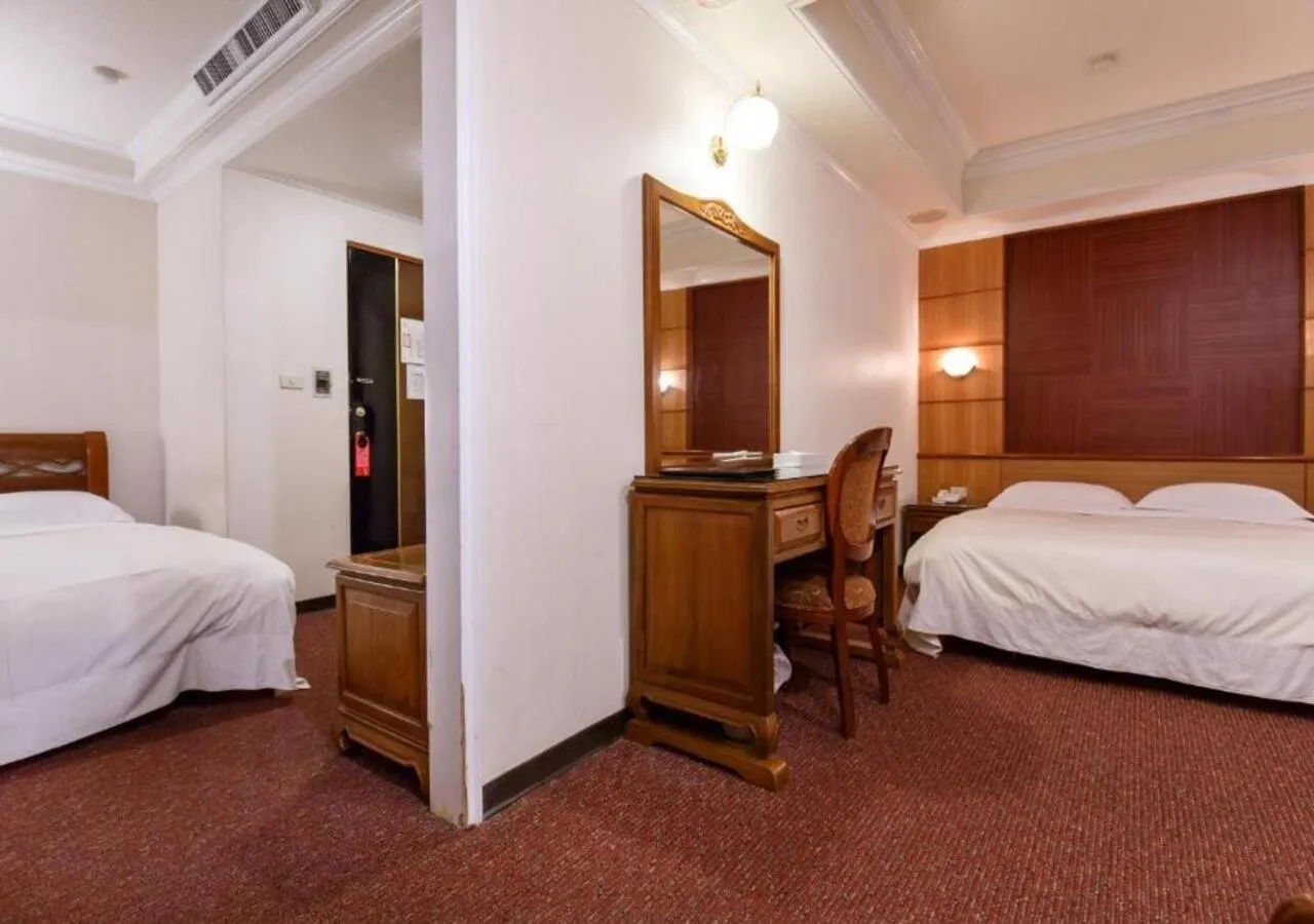 Bed in Champion Hotel