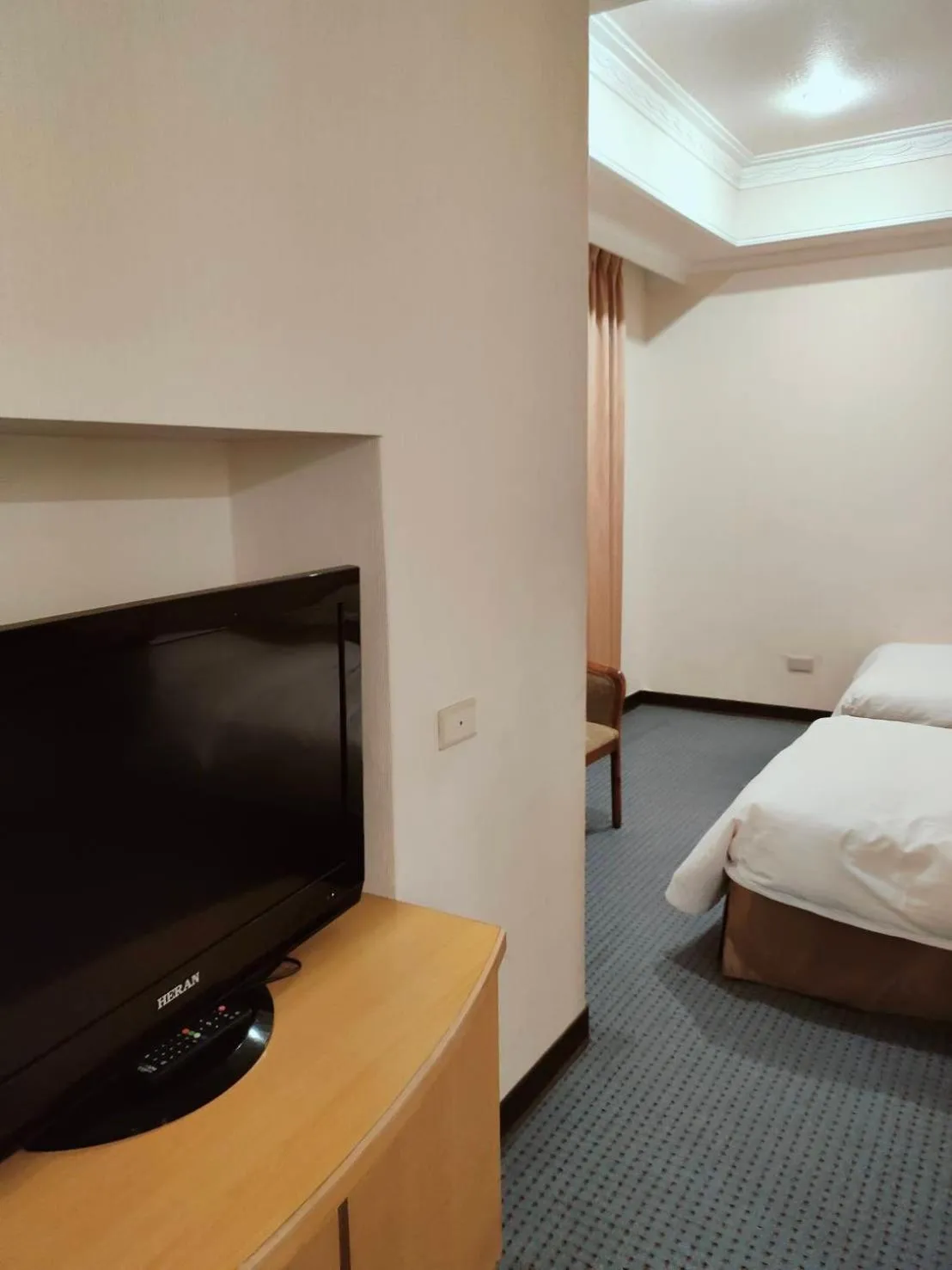 Bed in Champion Hotel