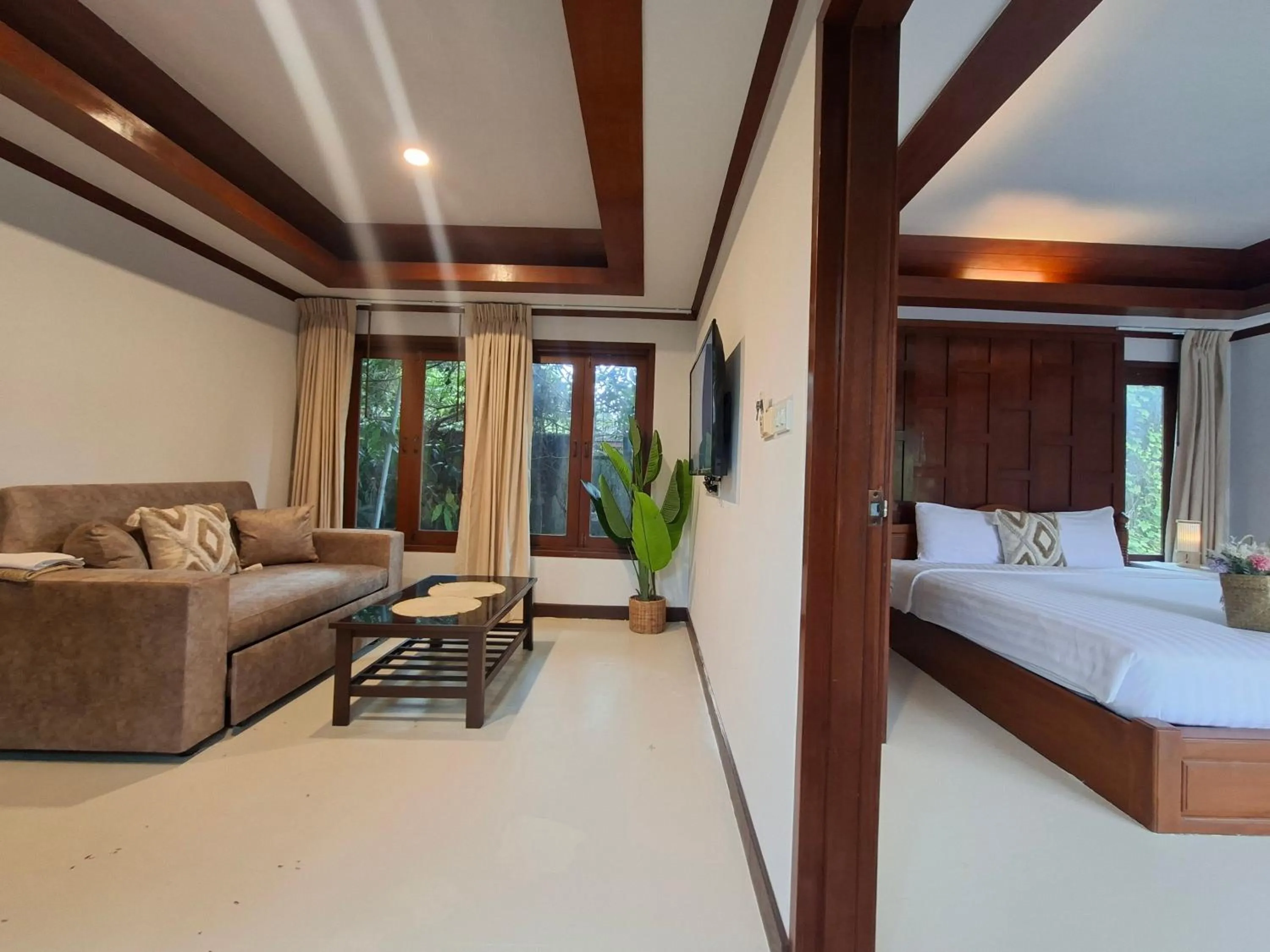 Bed in Kaya Mani Thai Villa resort