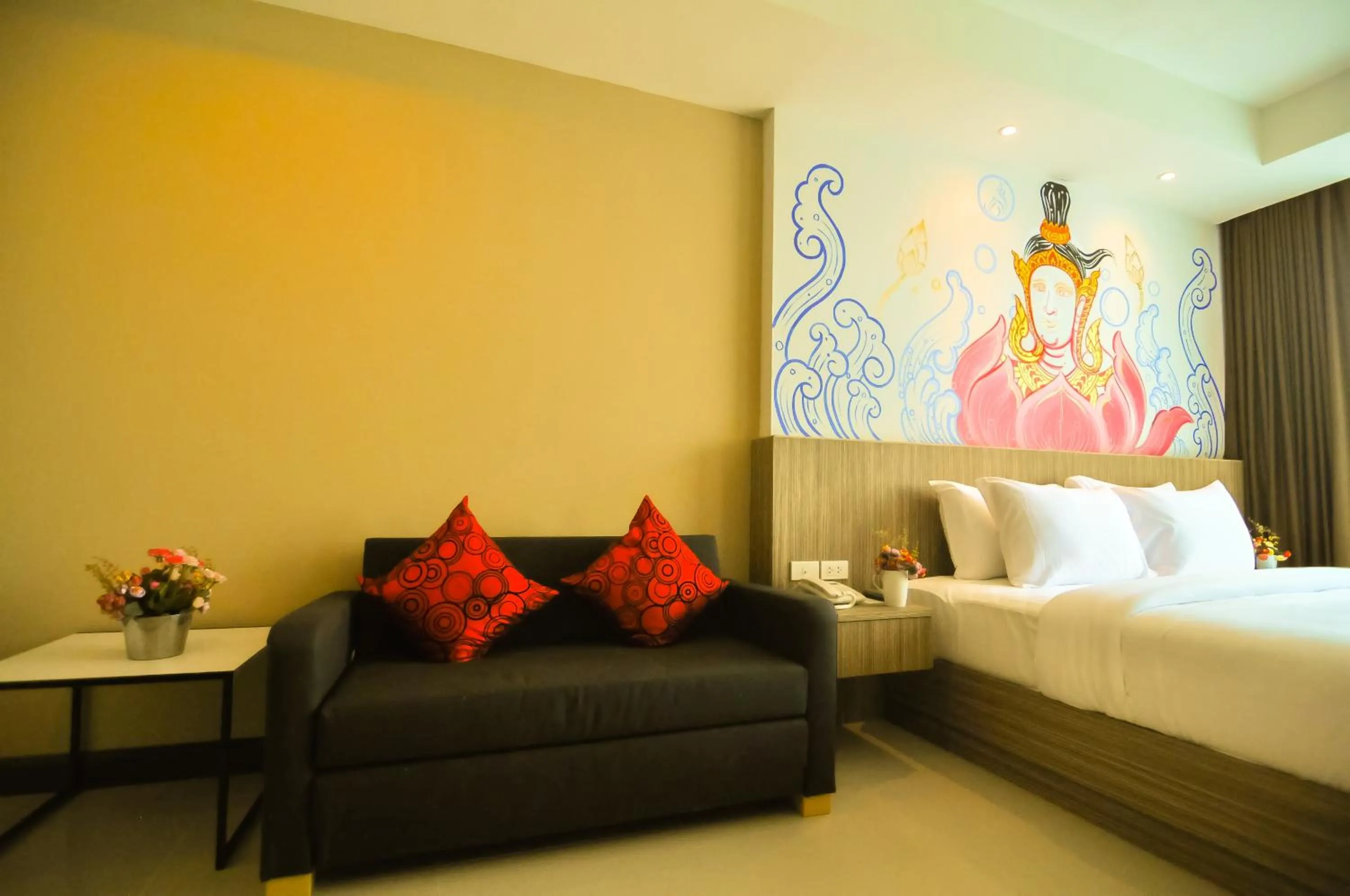 Seating area, Bed in The Sila Hotel