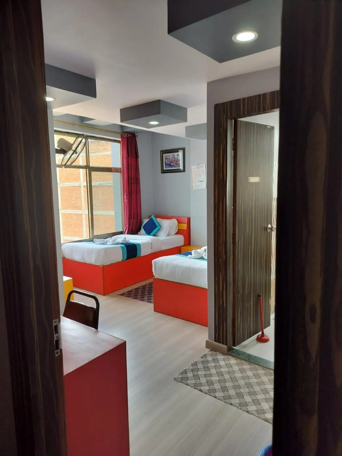 Bed in Three Brothers Apartment and Hotel