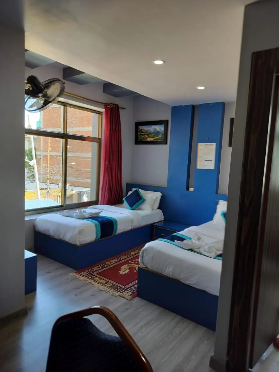 Photo of the whole room, Bed in Three Brothers Apartment and Hotel