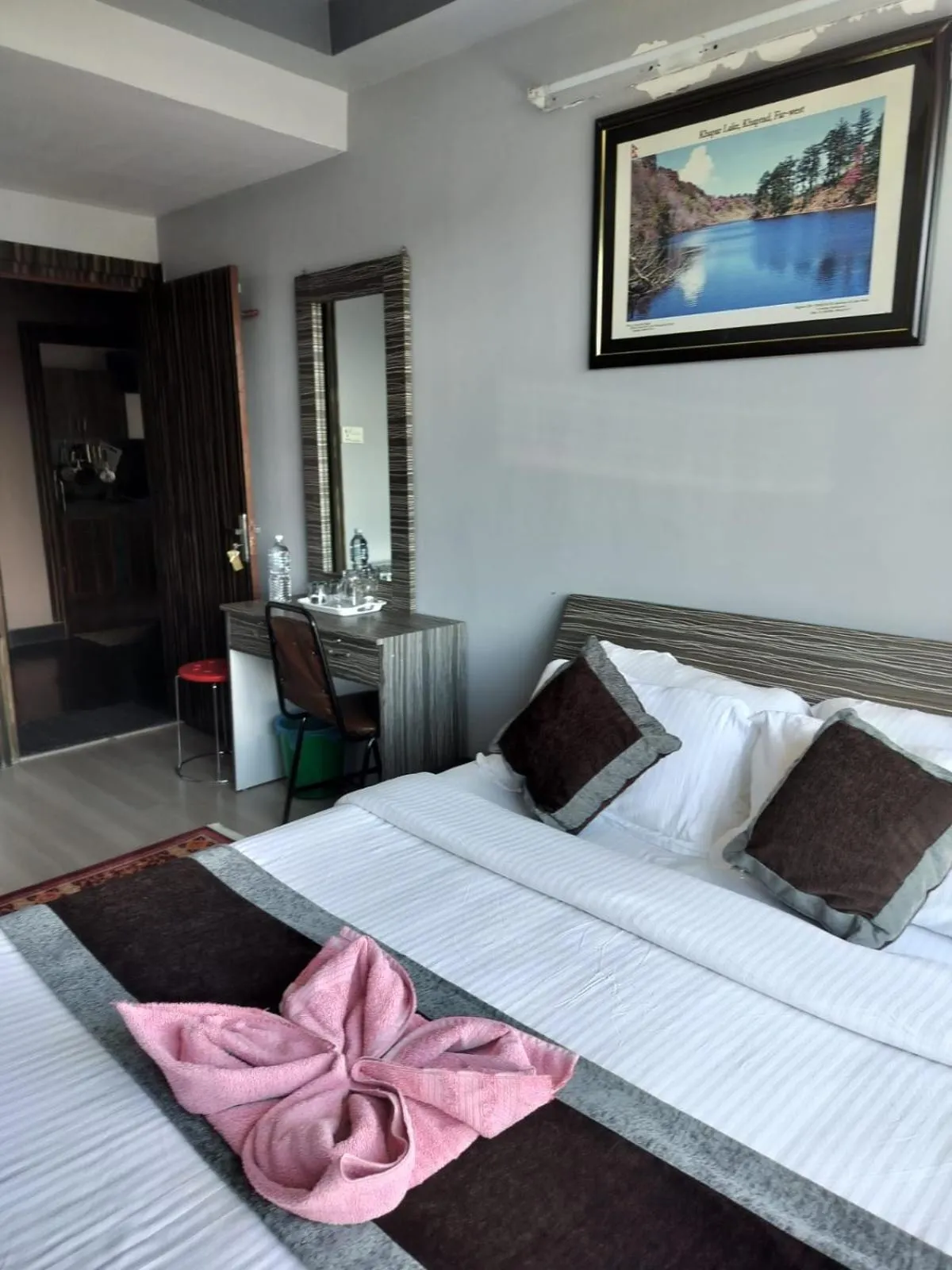 Bed in Three Brothers Apartment and Hotel