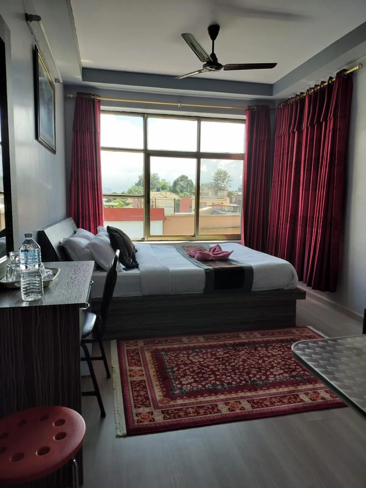 Bed in Three Brothers Apartment and Hotel