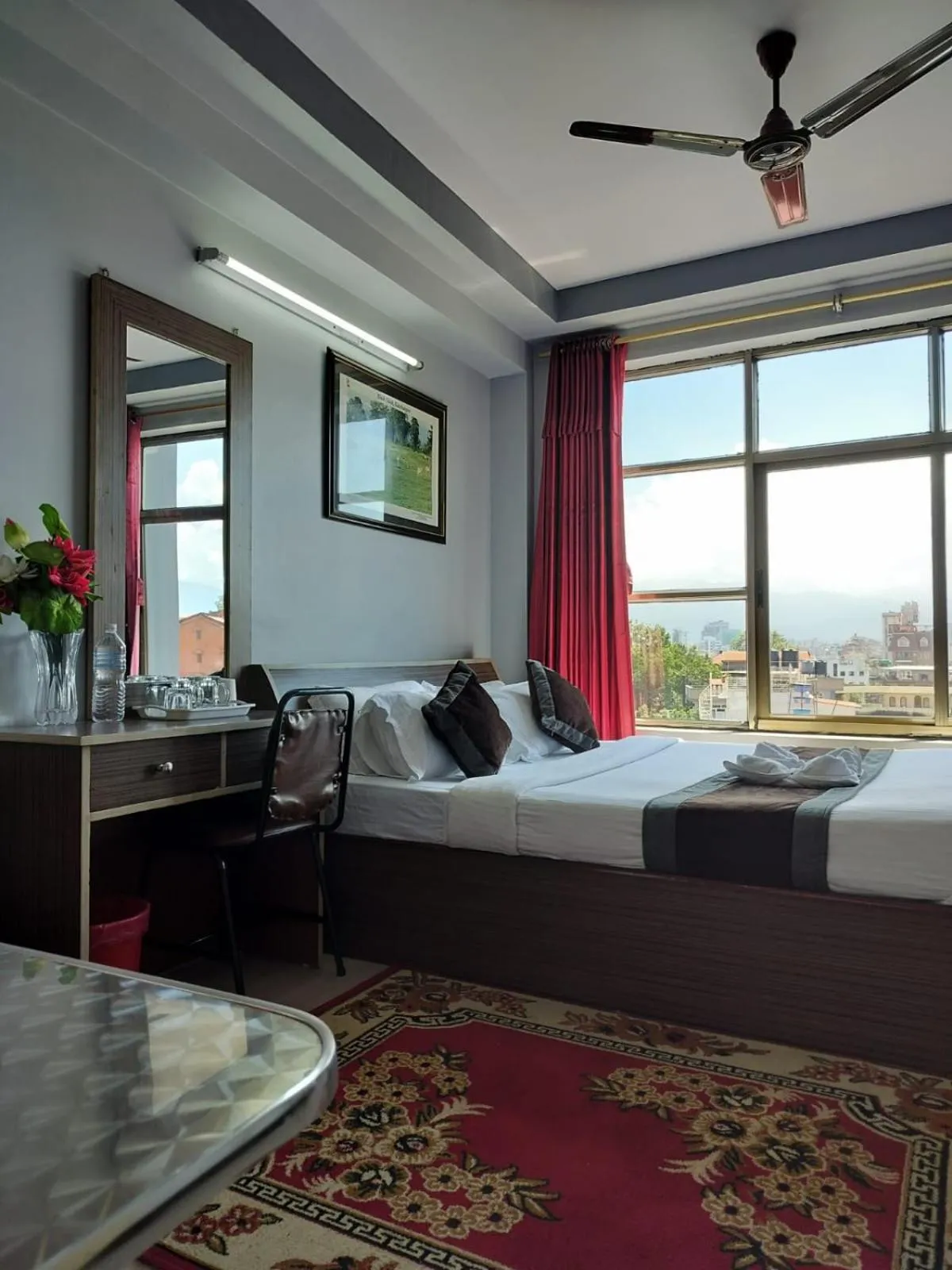 Bed in Three Brothers Apartment and Hotel