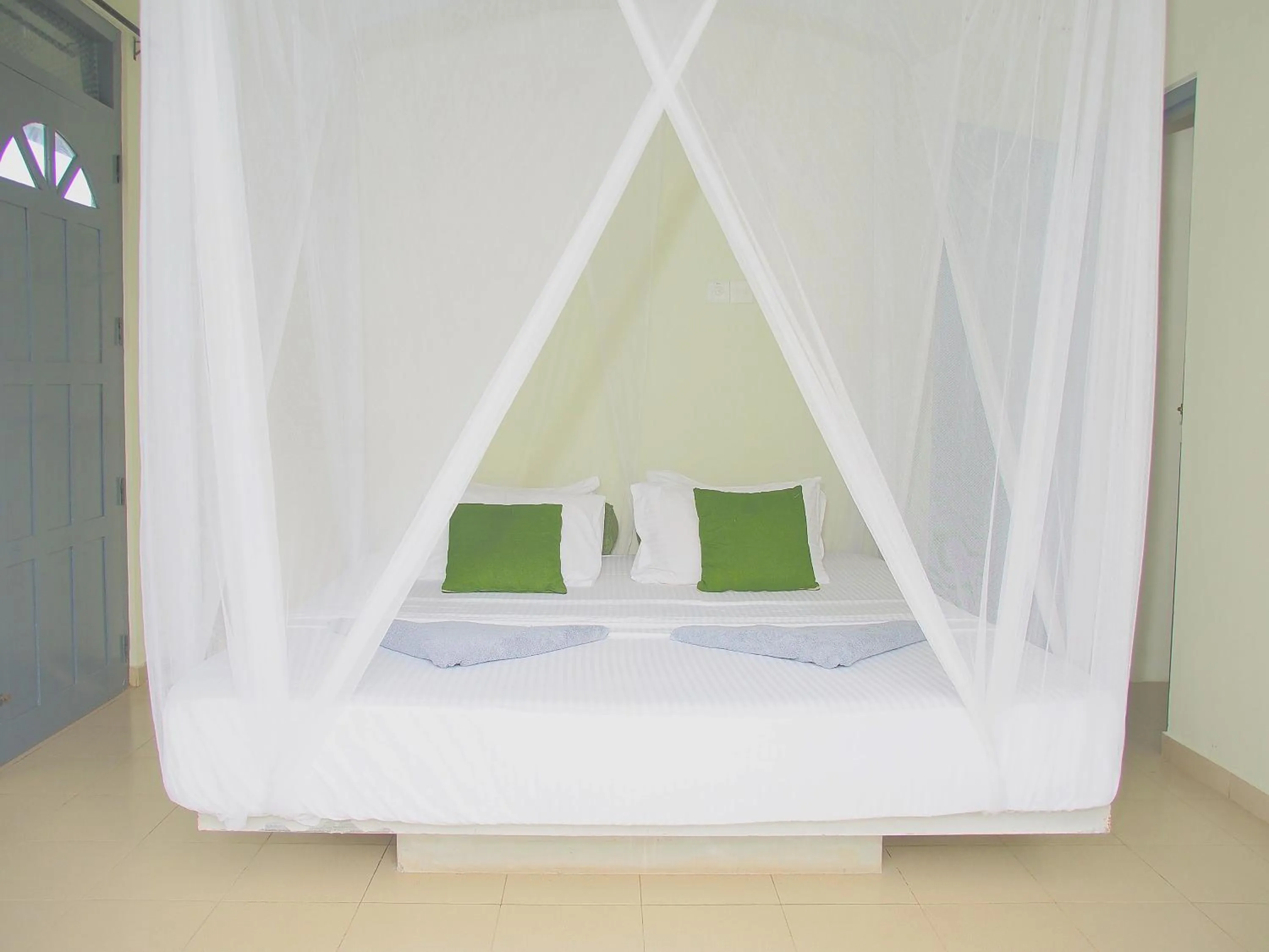 Bed in Secret Garden Galle Fort