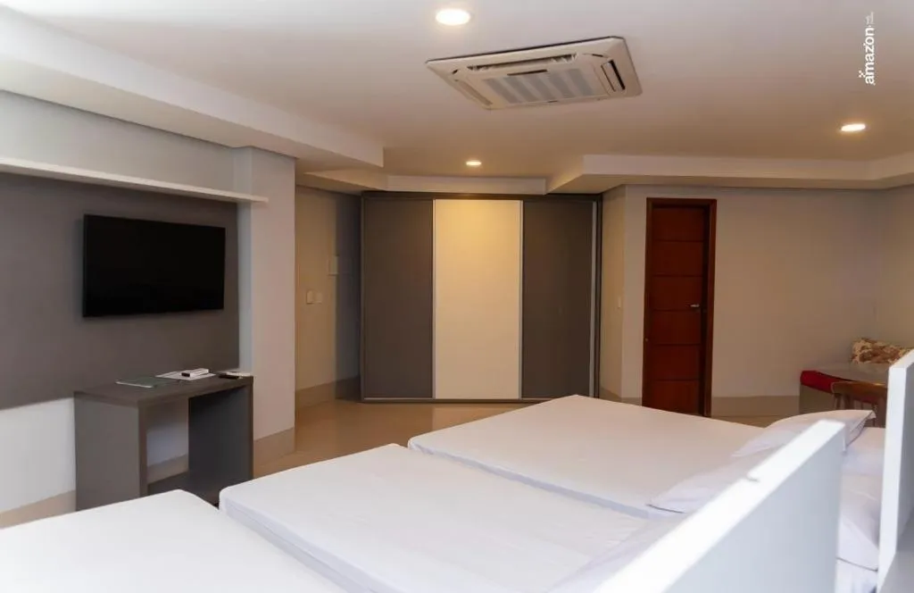 air conditioner, Bed in Pumma Business Hotel