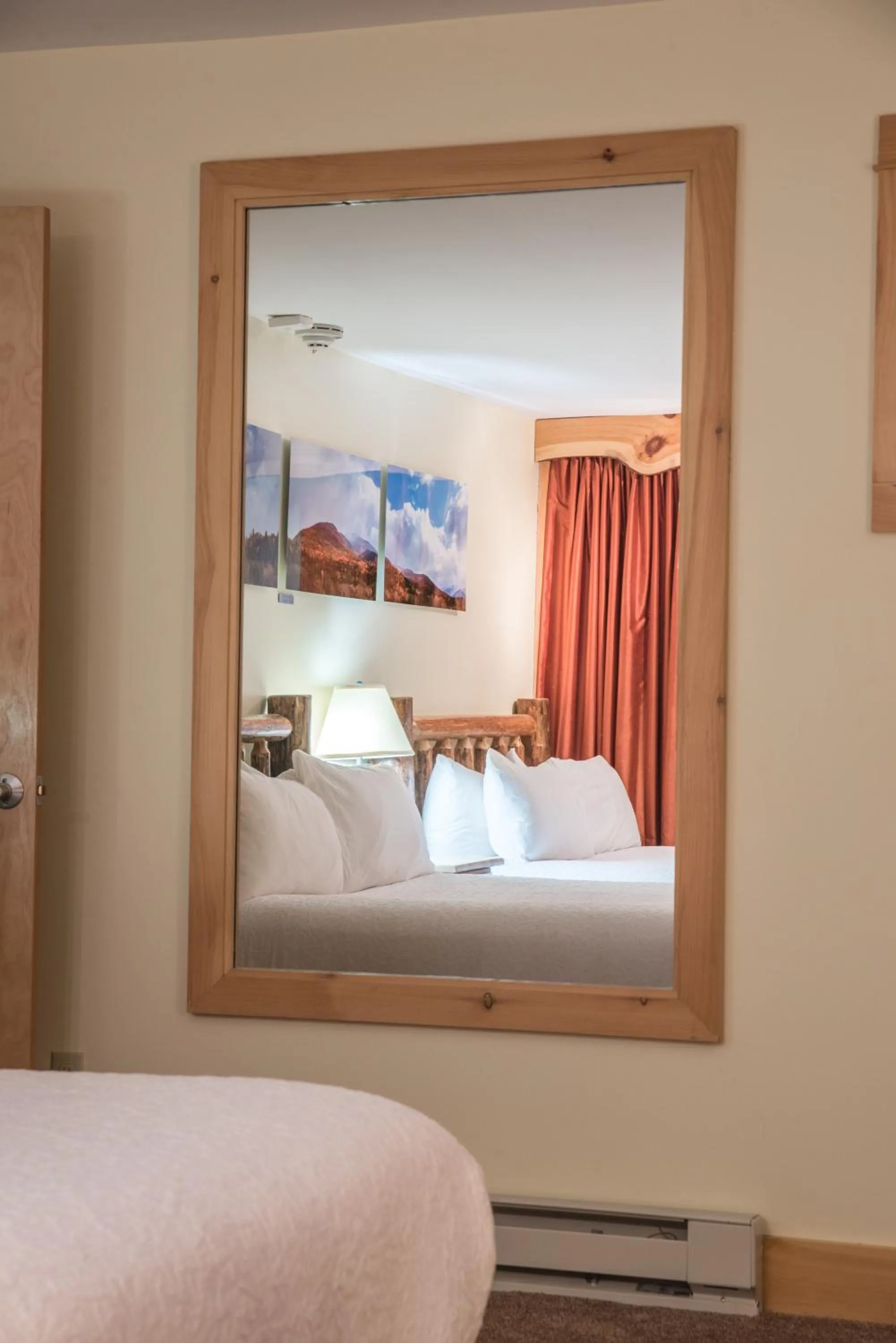 Bed in Adirondack Spruce Lodge