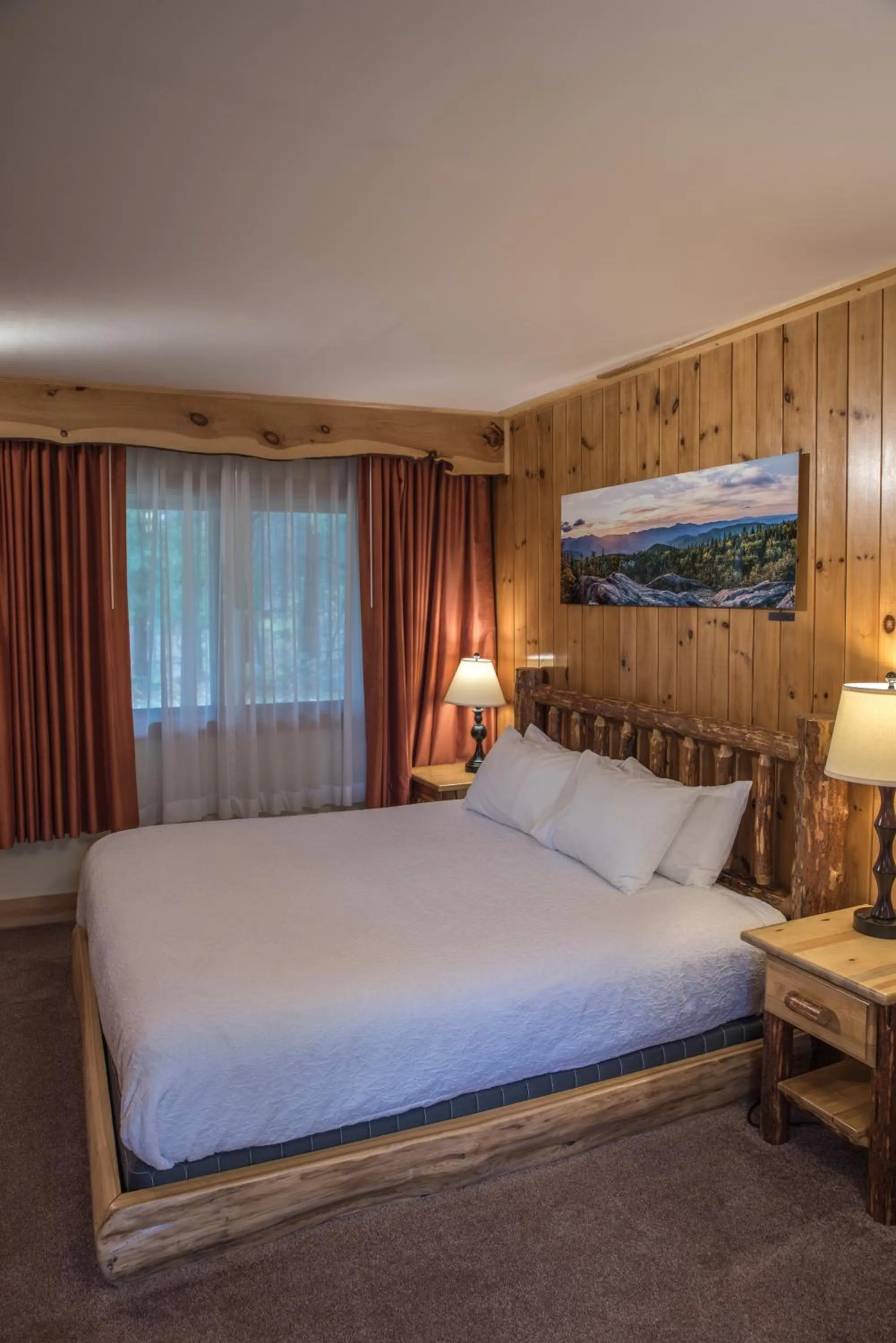 Bed in Adirondack Spruce Lodge