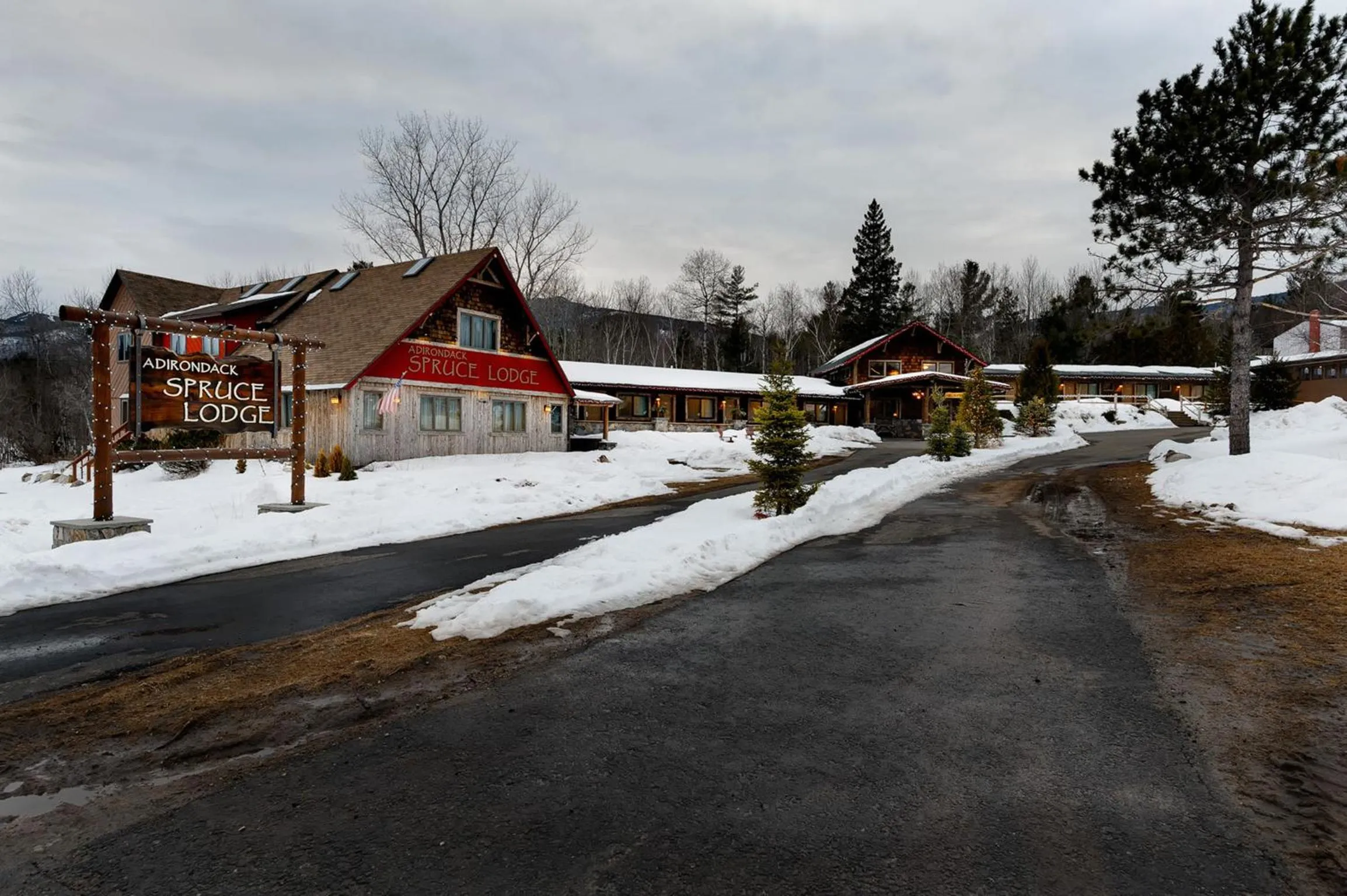 Property logo or sign in Adirondack Spruce Lodge