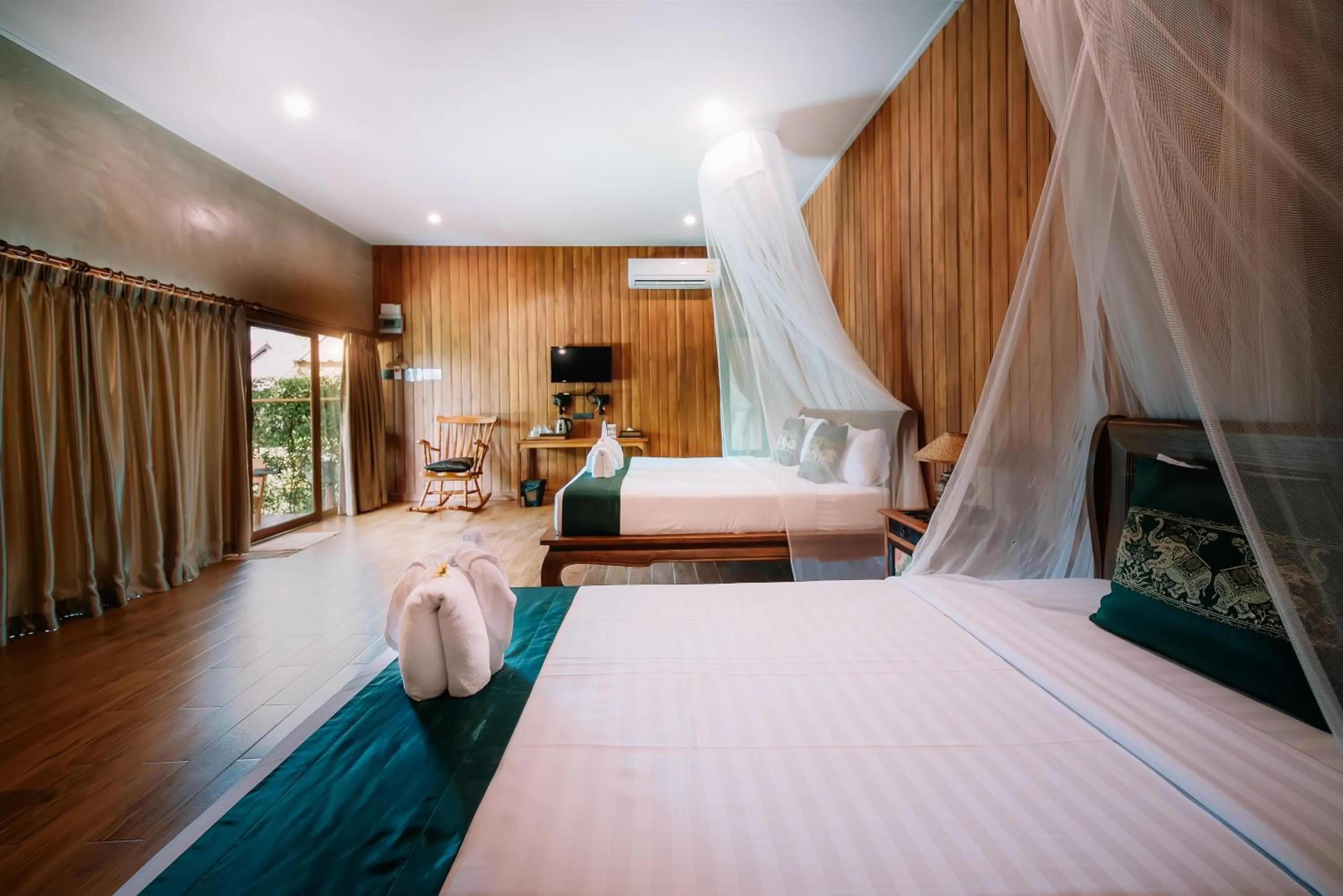 Photo of the whole room, Bed in Sawasdee Sukhothai Resort