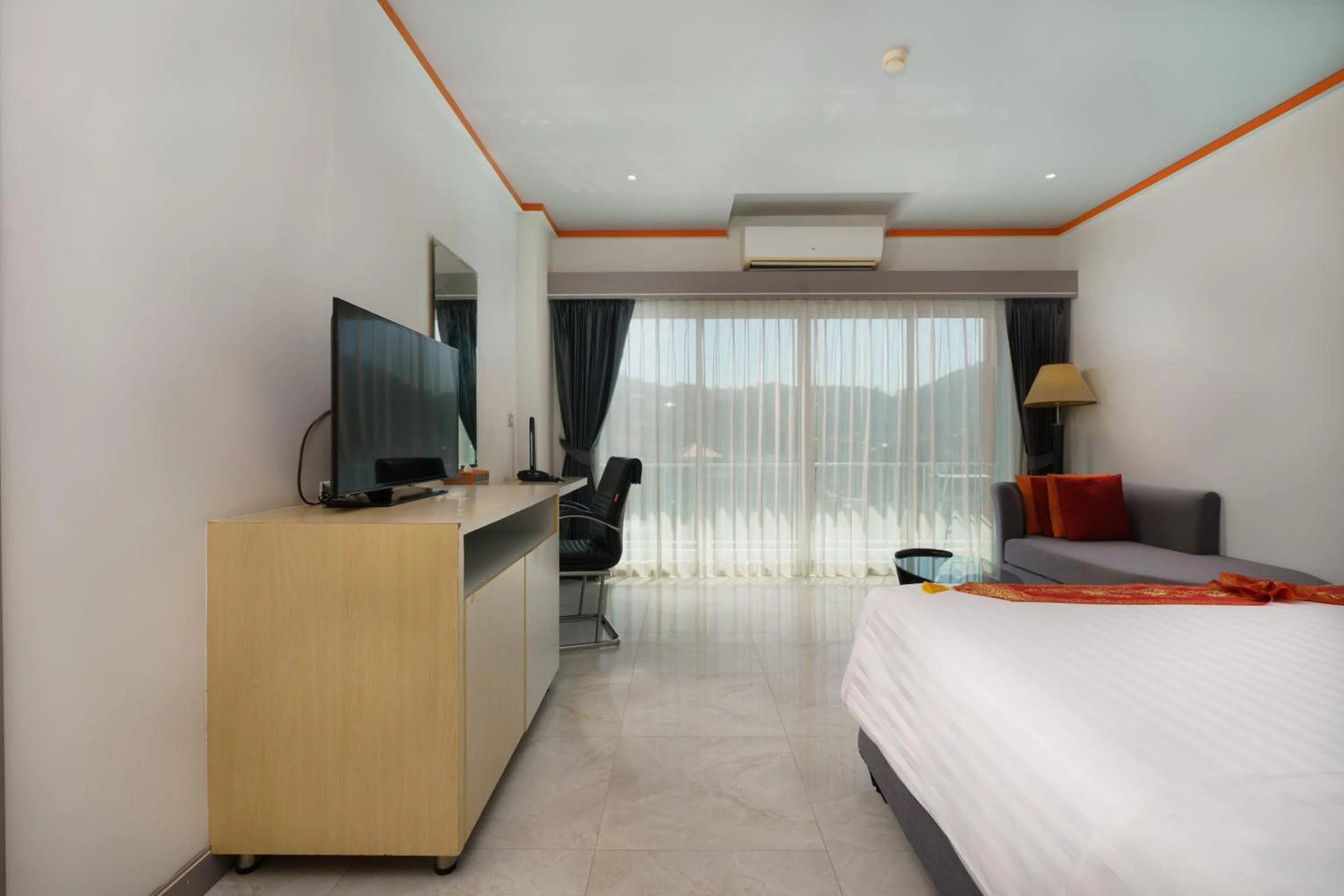 Bed in Chabana Kamala Hotel