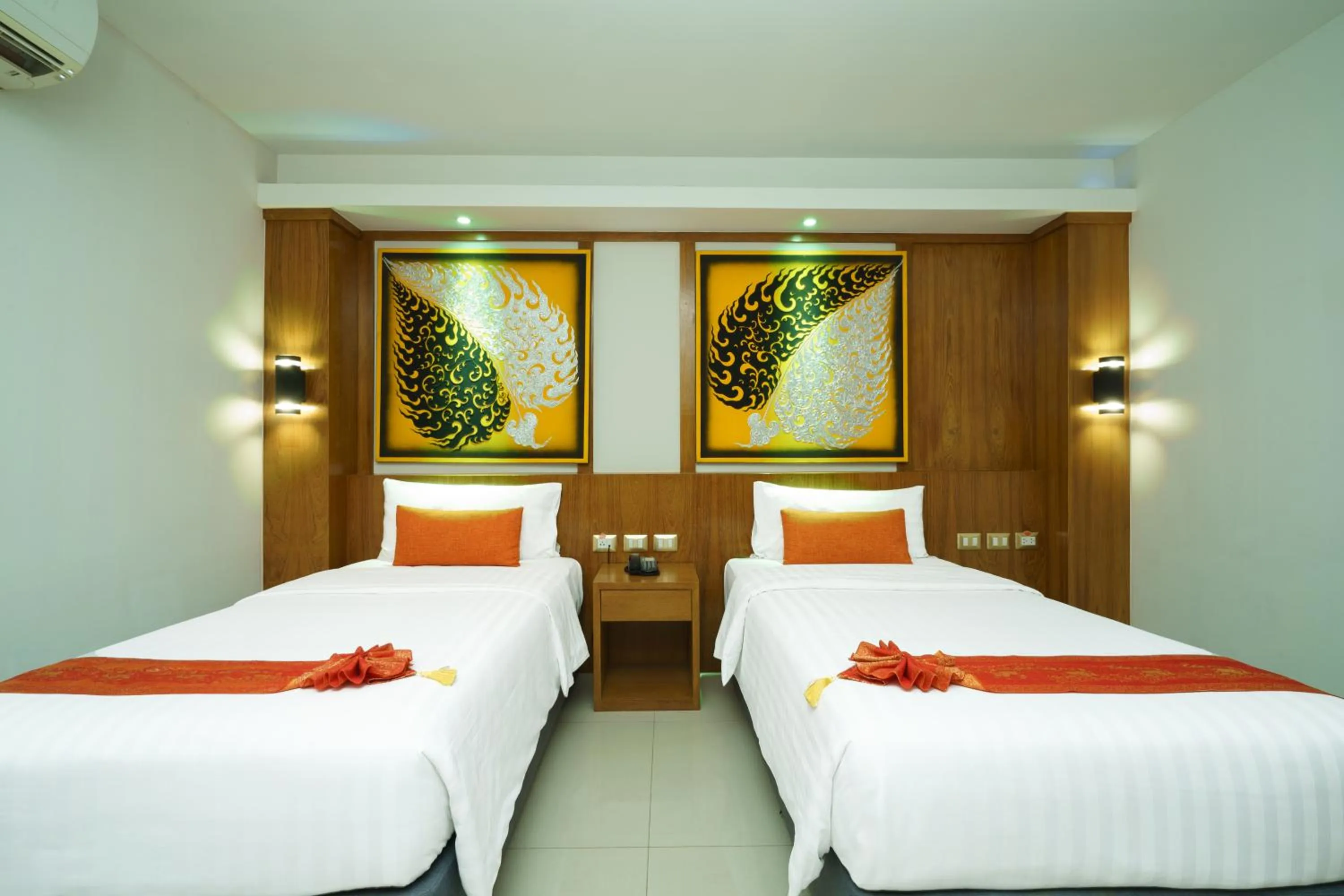 Bed in Chabana Kamala Hotel