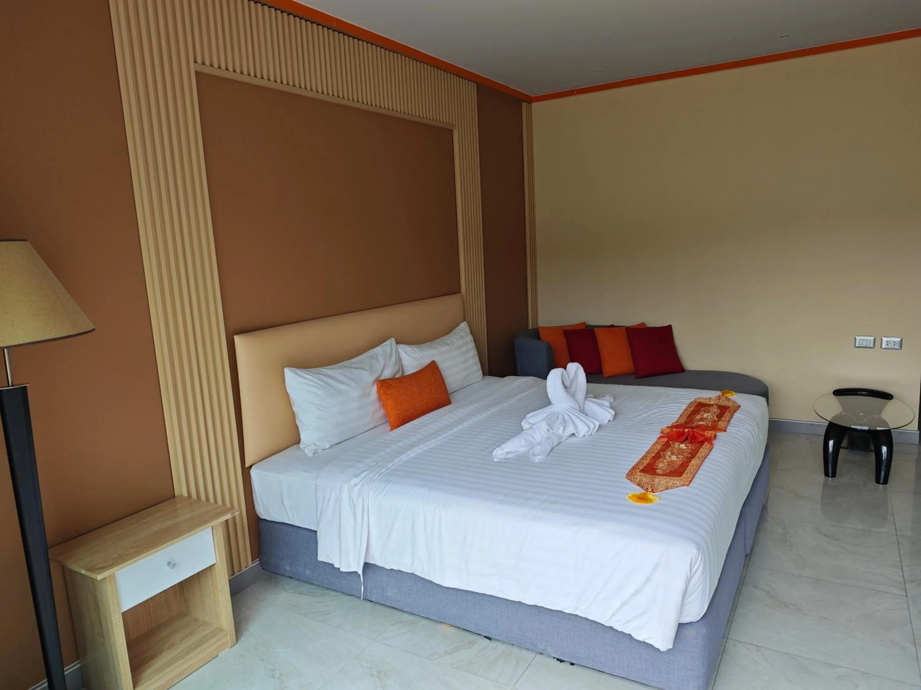 Bed in Chabana Kamala Hotel