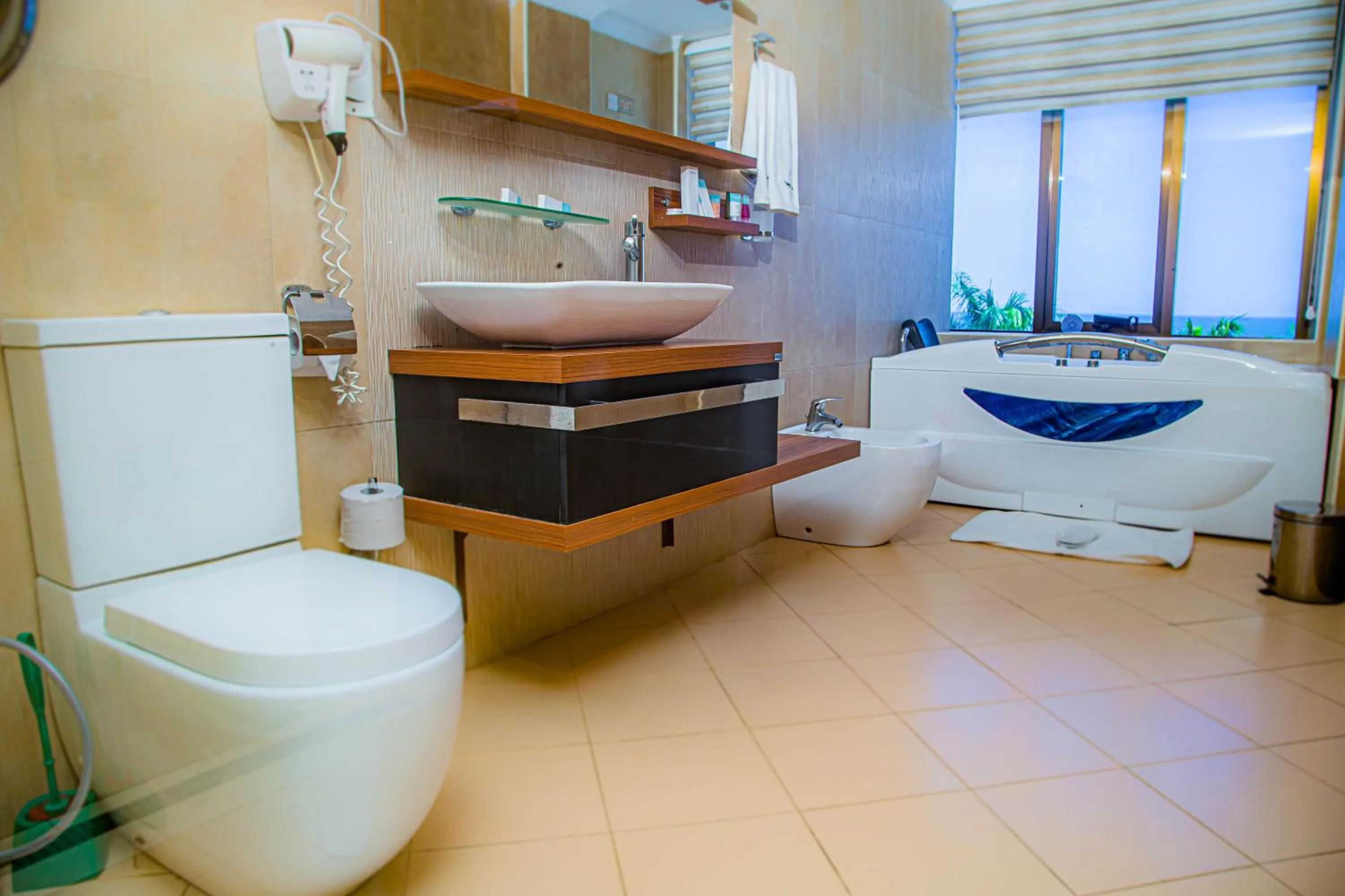 Bathroom in Tanga Beach Resort & Spa