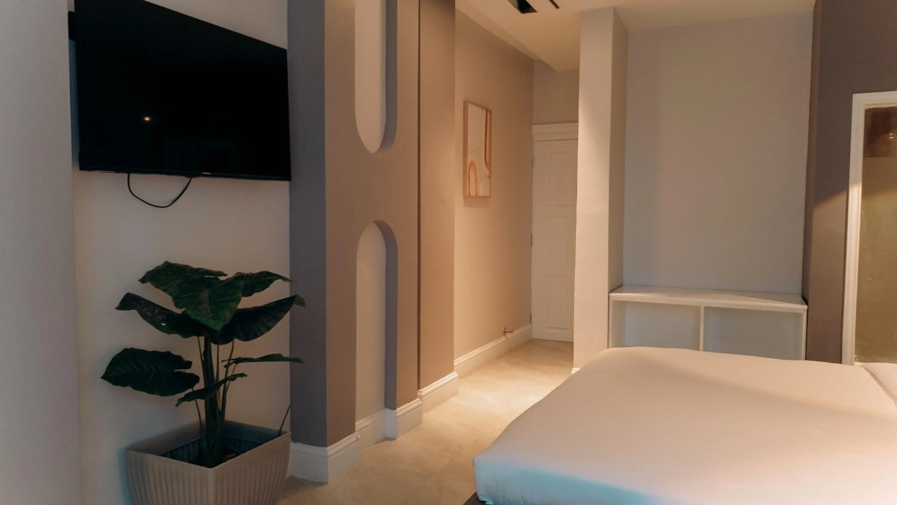 Bed in Tanga Beach Resort & Spa