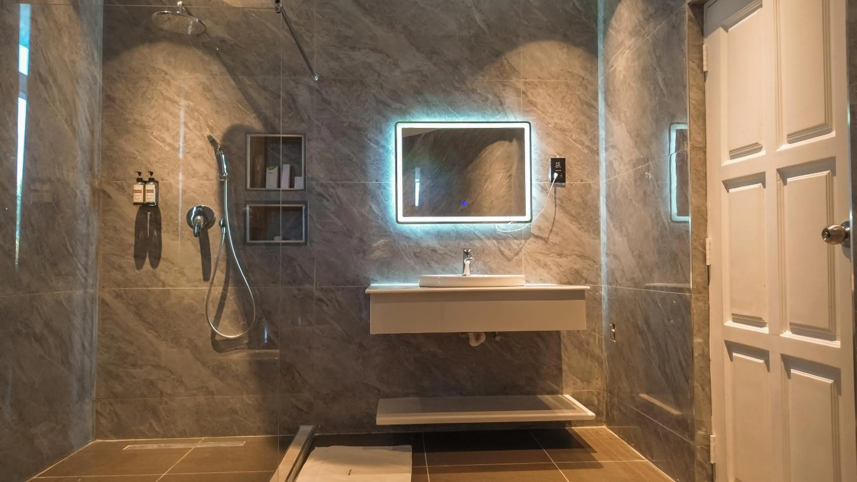 Bathroom in Tanga Beach Resort & Spa