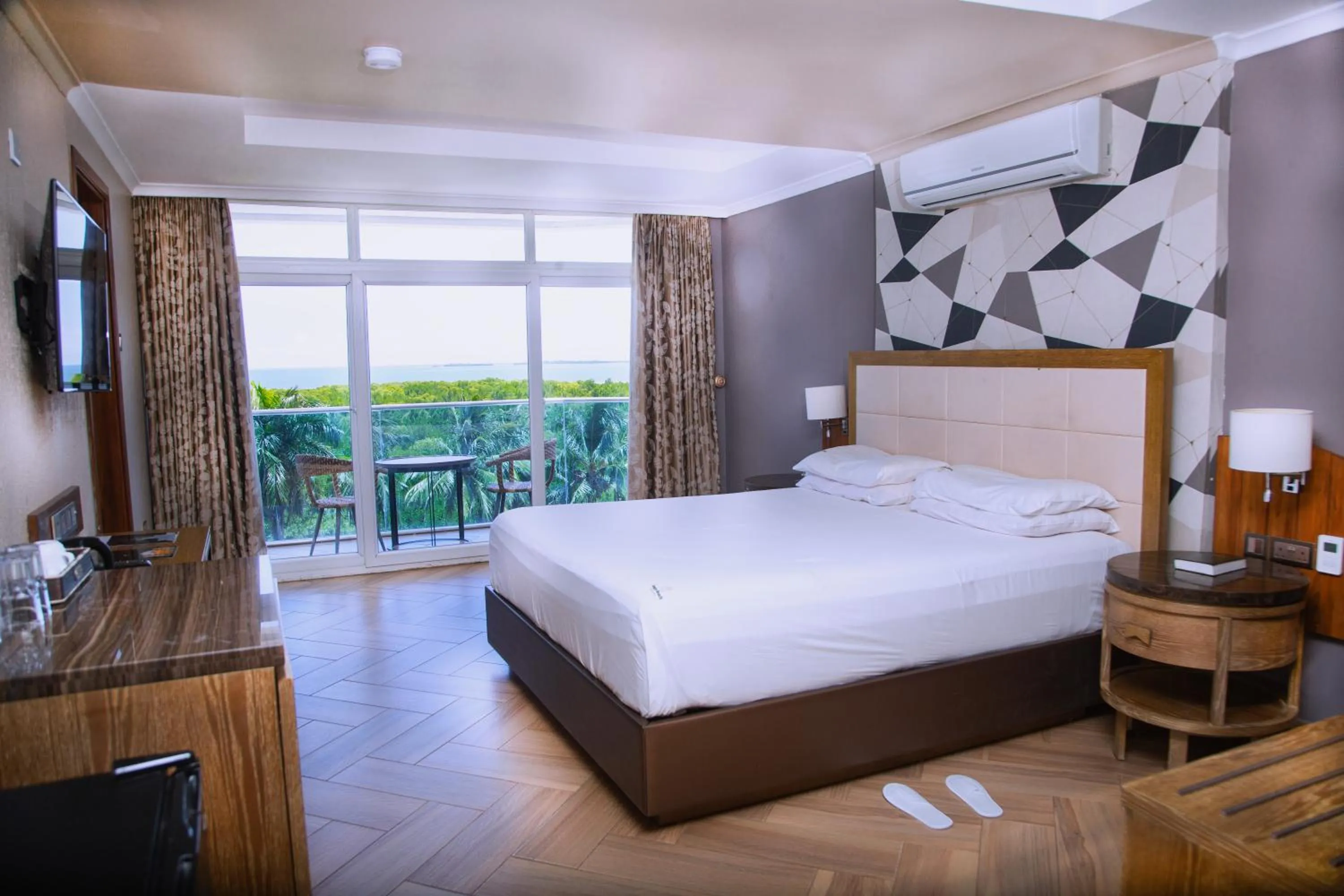 Bed in Tanga Beach Resort & Spa