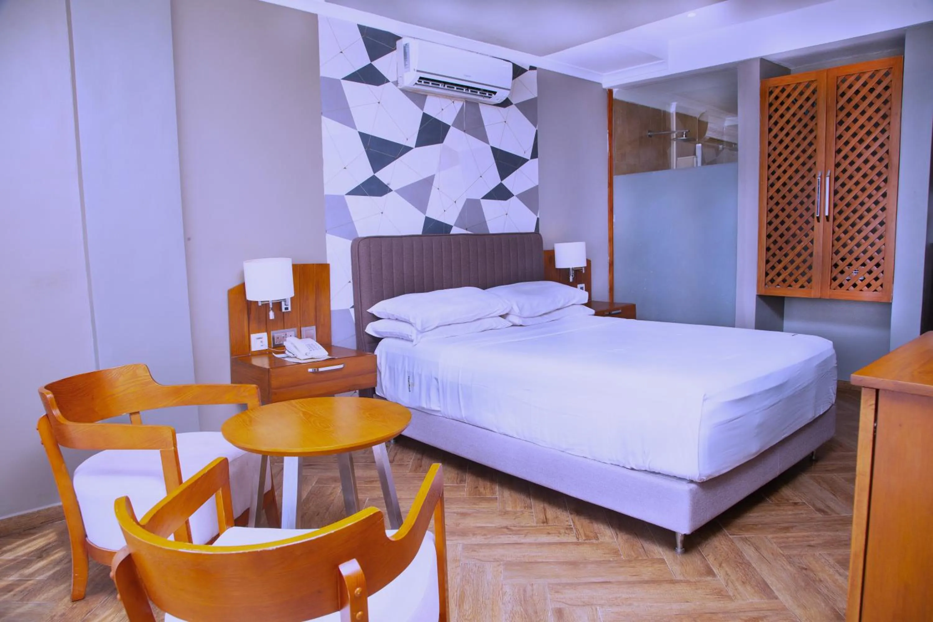 Bed in Tanga Beach Resort & Spa