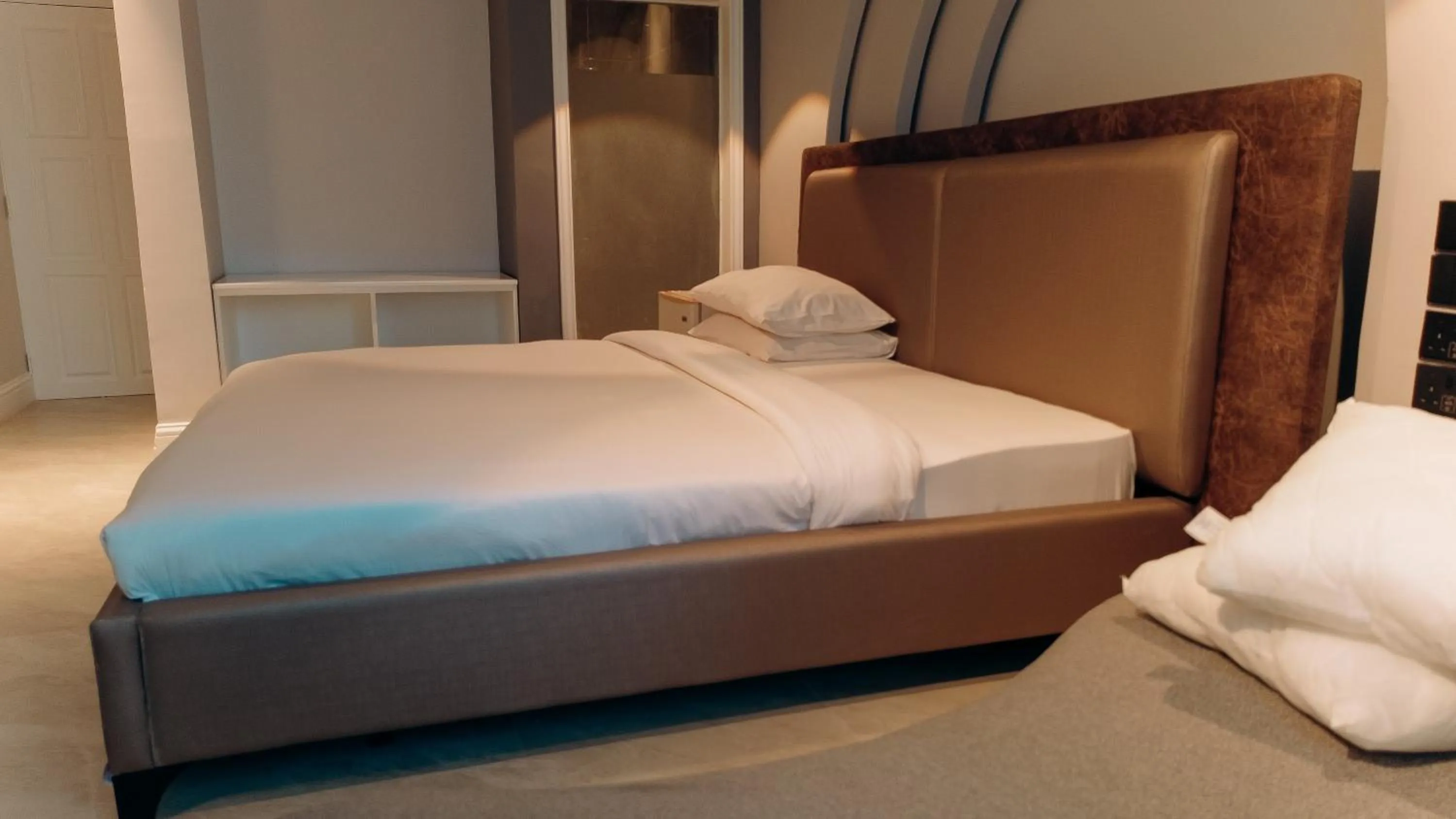 Bed in Tanga Beach Resort & Spa