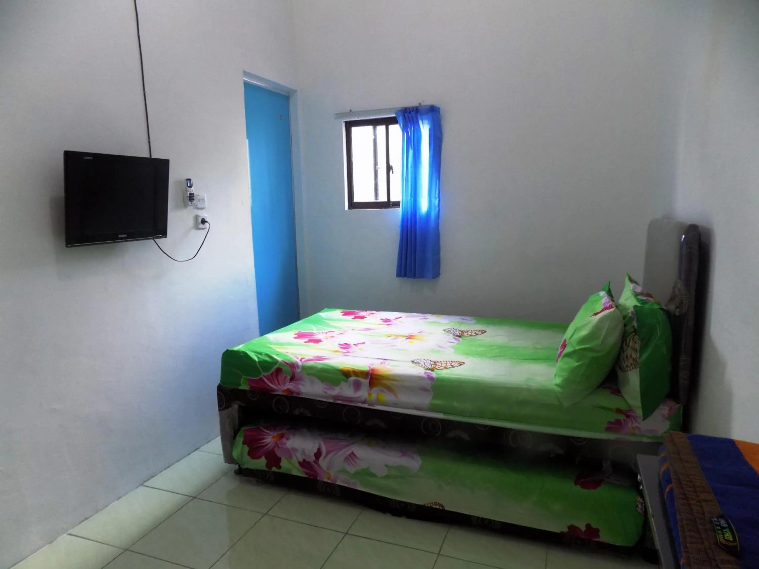 Bed in Amelia 2 Guest House Syariah