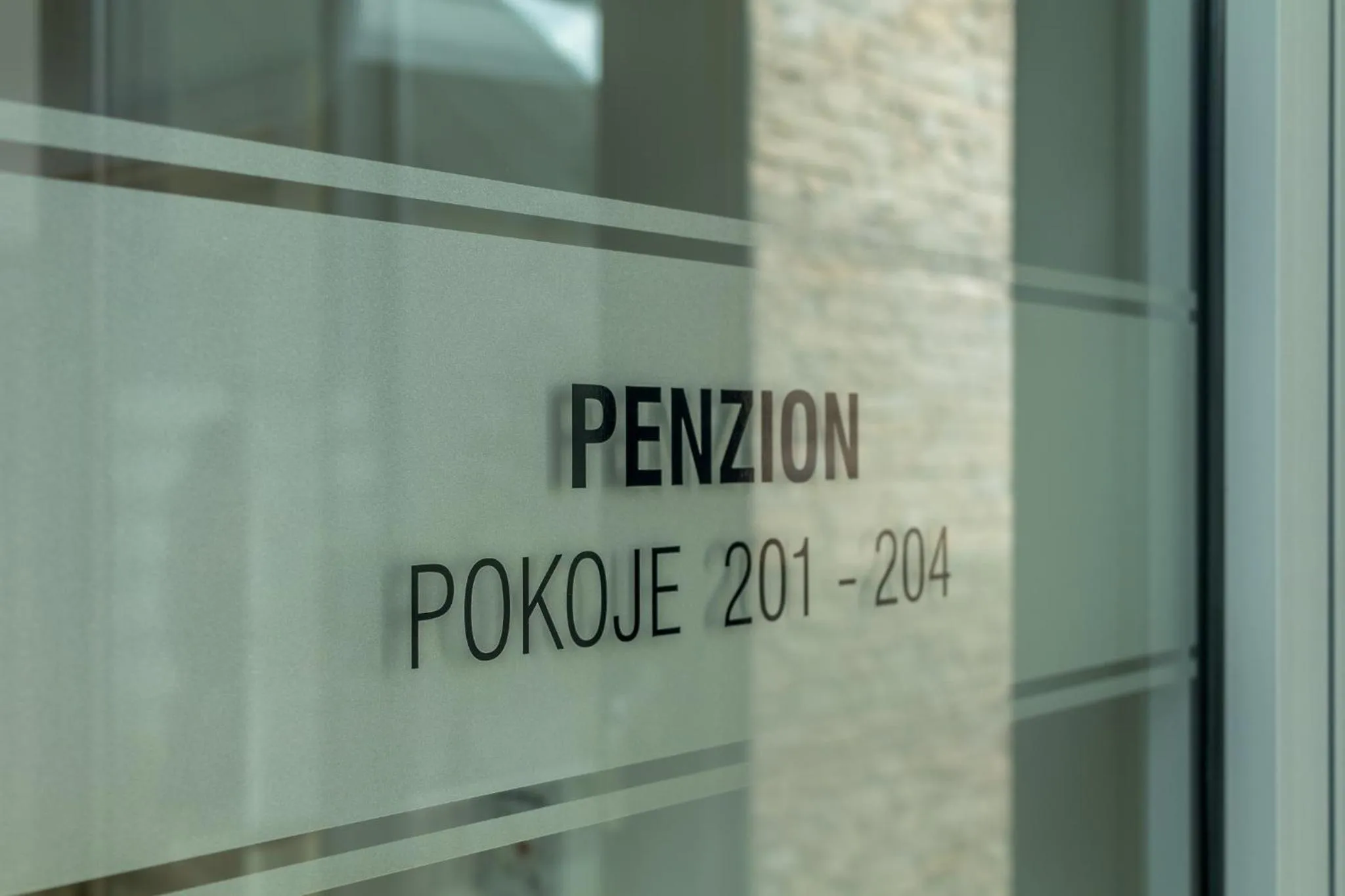 Text overlay in Penzion Na Náměstí