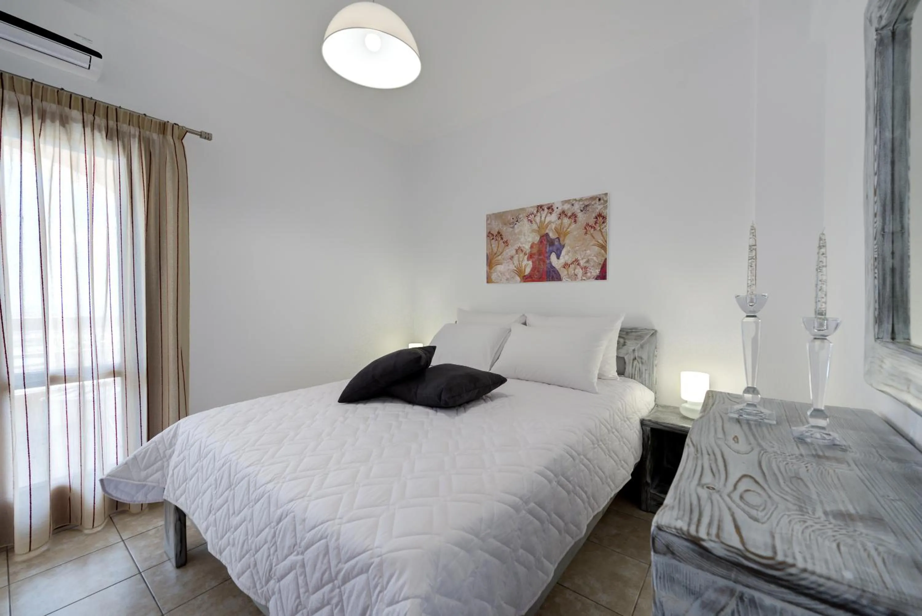 Bedroom in Akrotiri Apartments