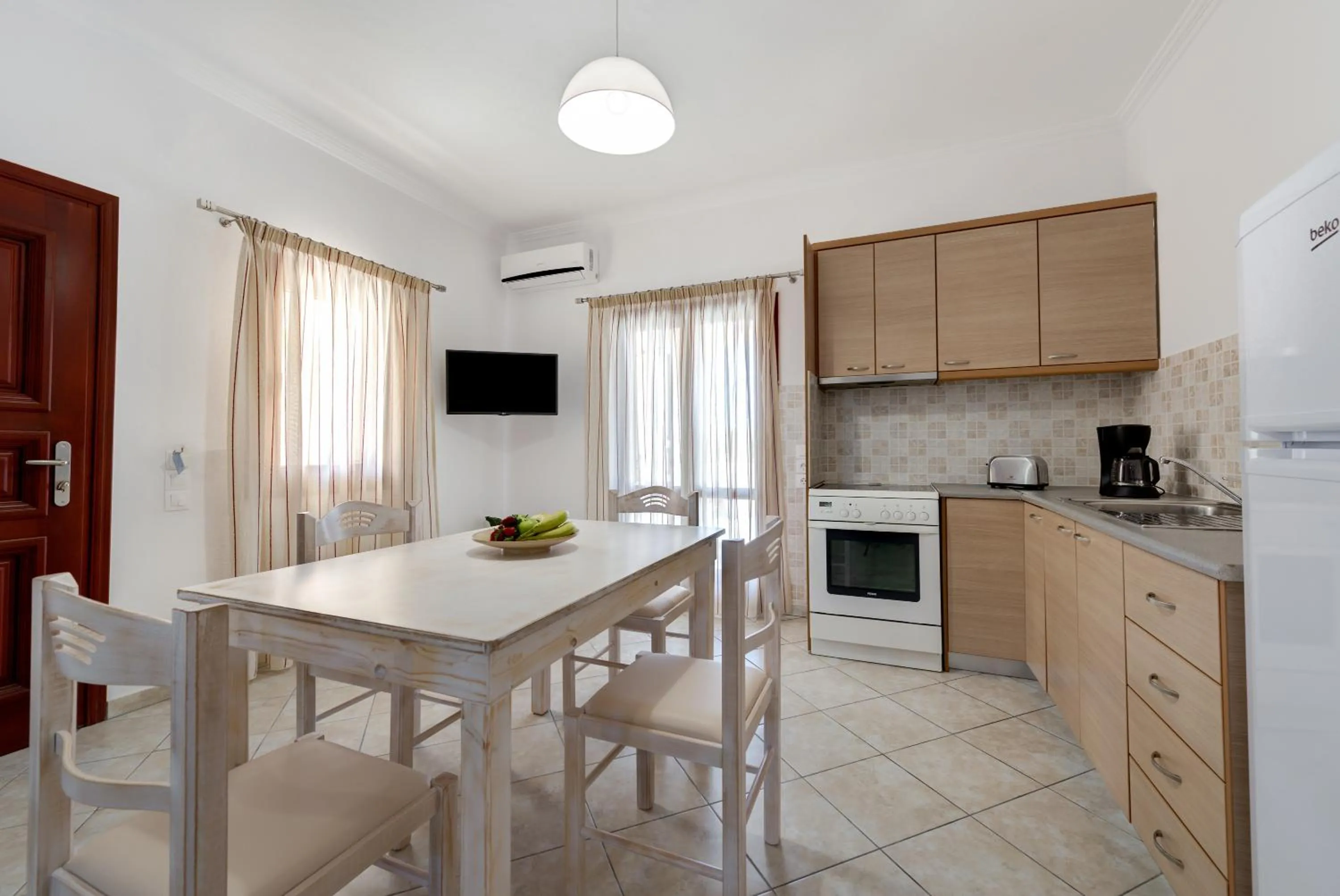 Kitchen or kitchenette in Akrotiri Apartments