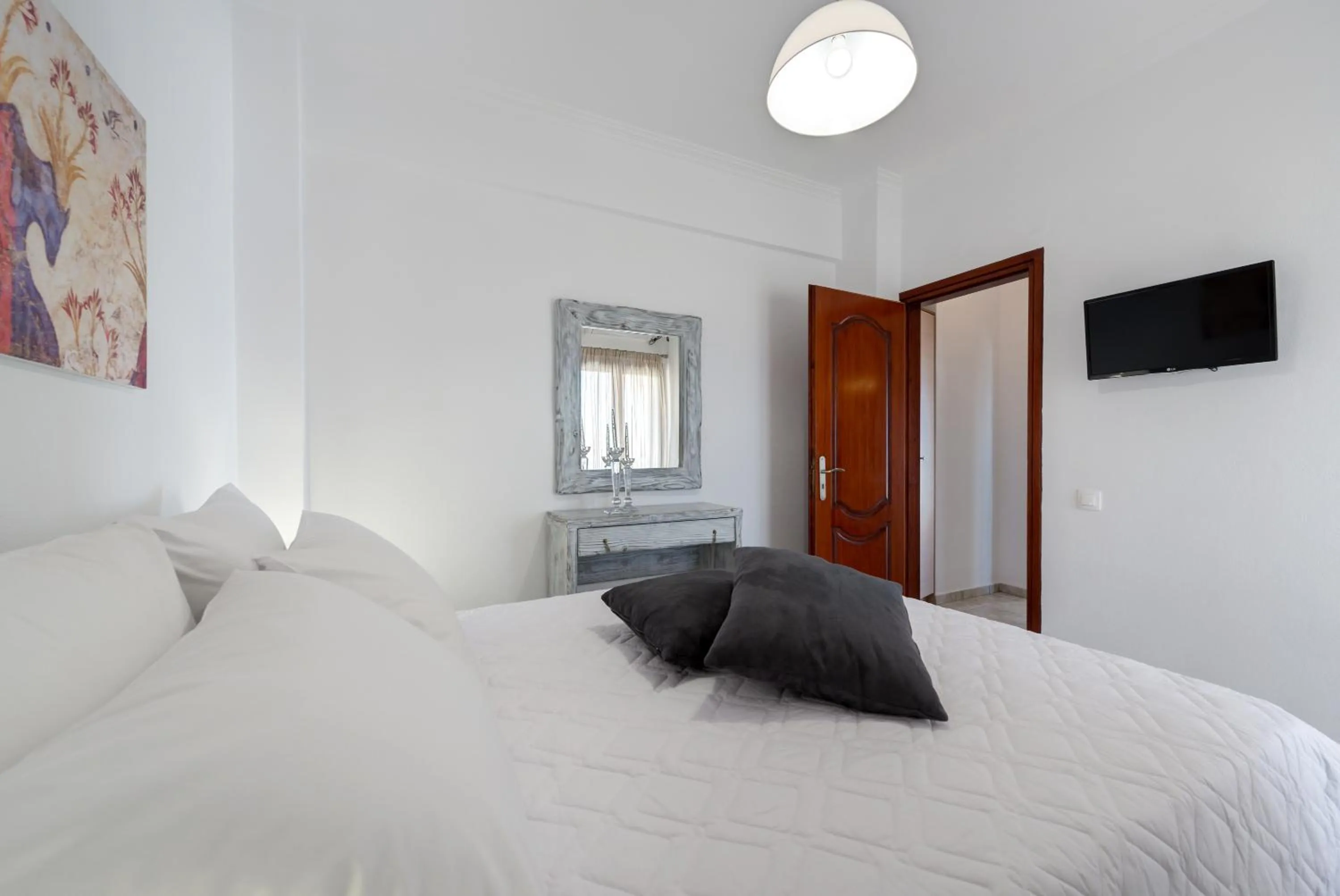 Bedroom in Akrotiri Apartments