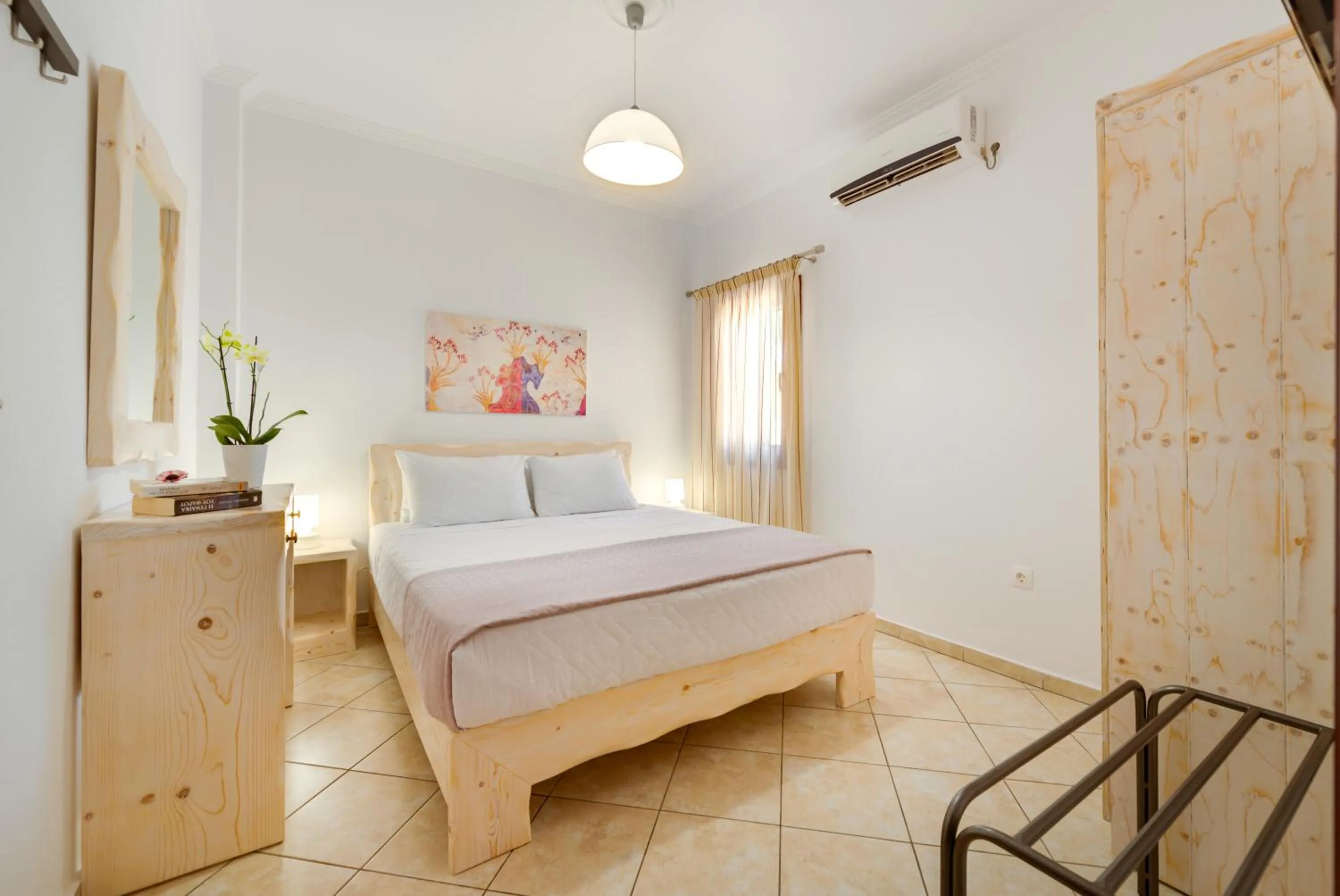 Bedroom in Akrotiri Apartments
