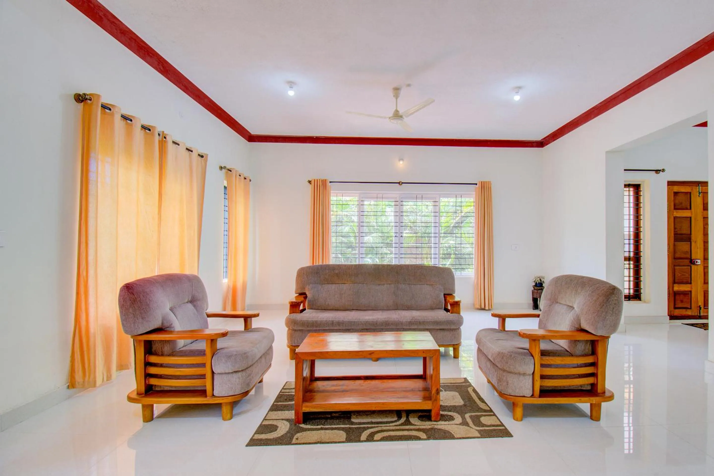 Communal lounge/ TV room in Holidayincoorg Orchid Villa