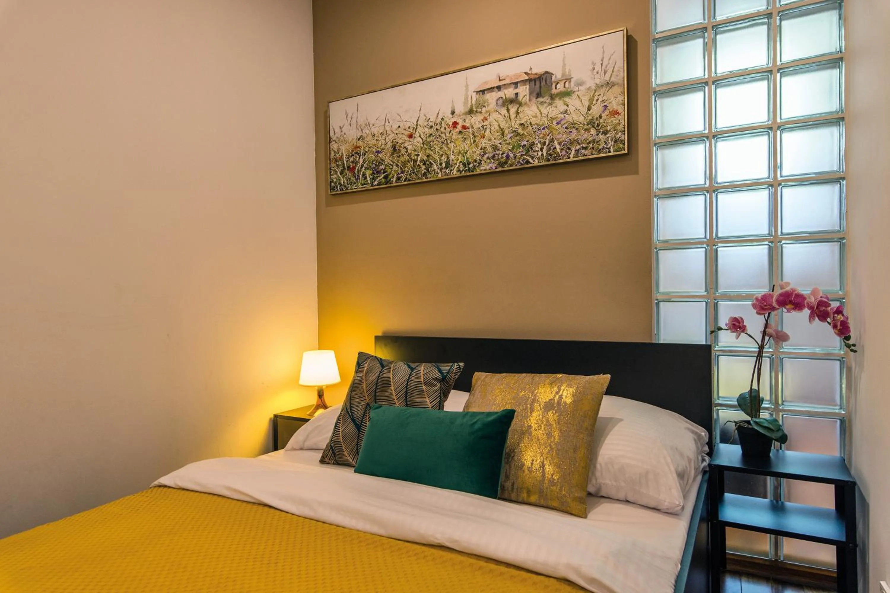 Bed in Galeria Italiana Apartments