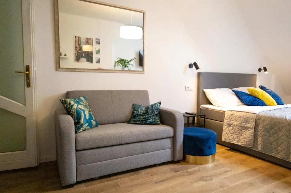 Bed in Galeria Italiana Apartments