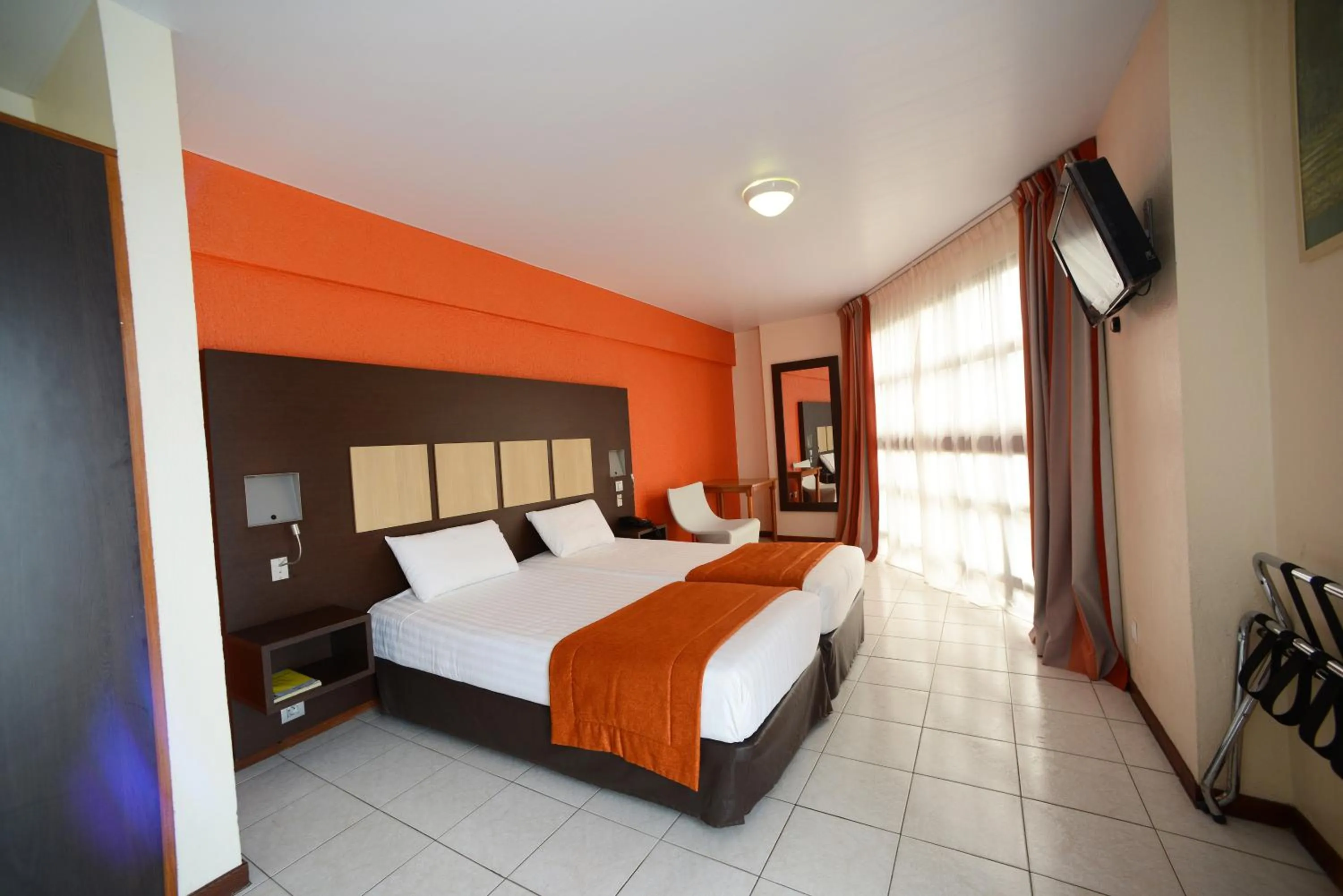 Decorative detail, Bed in Central Hotel Cayenne