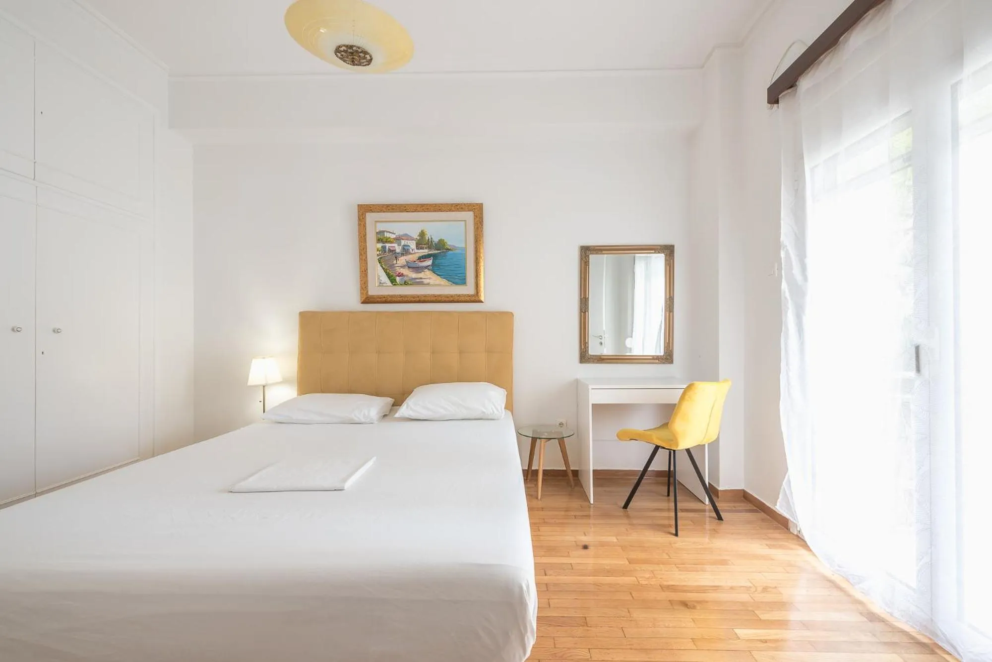 Bed in Victoria Secret Apartments