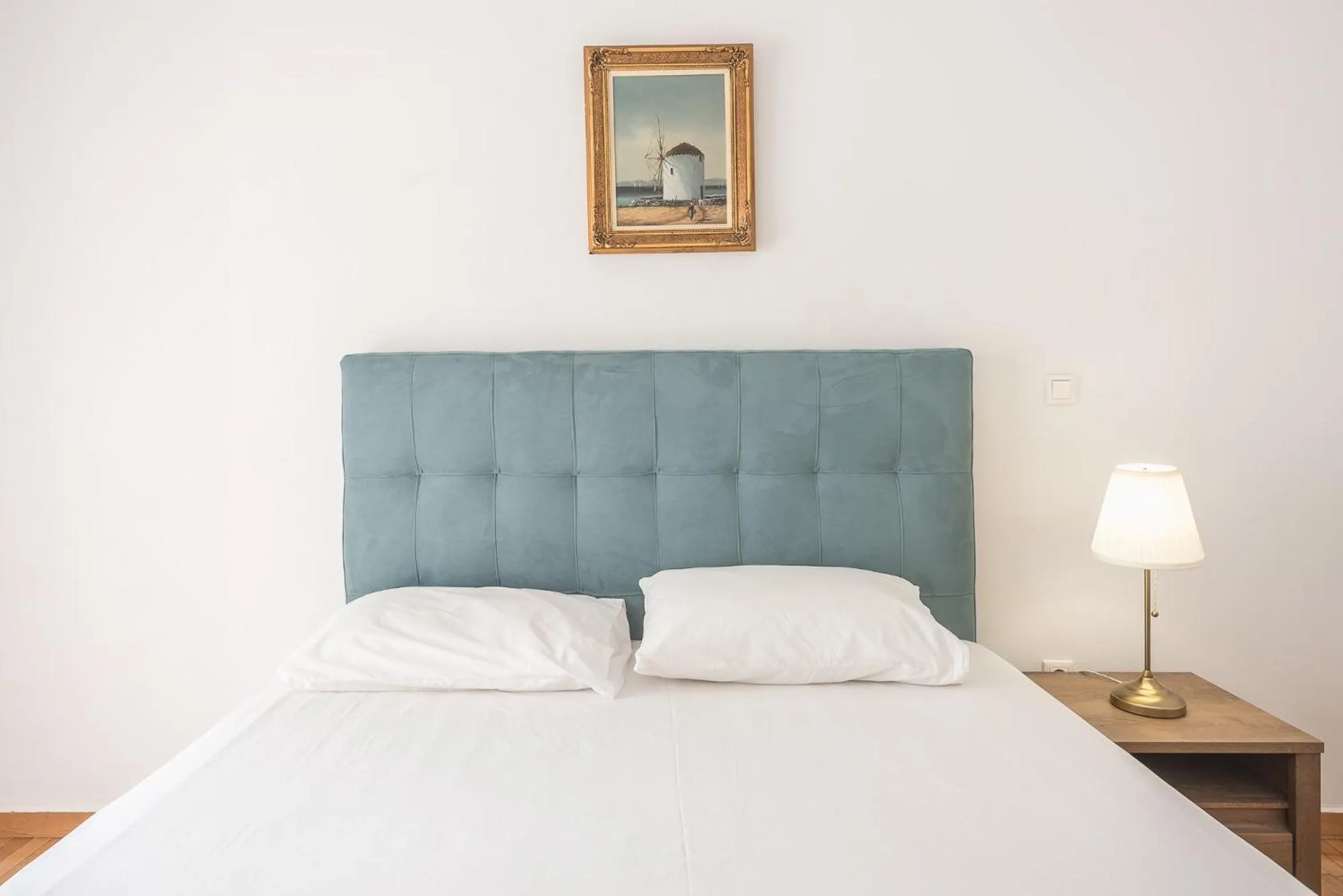 Bed in Victoria Secret Apartments