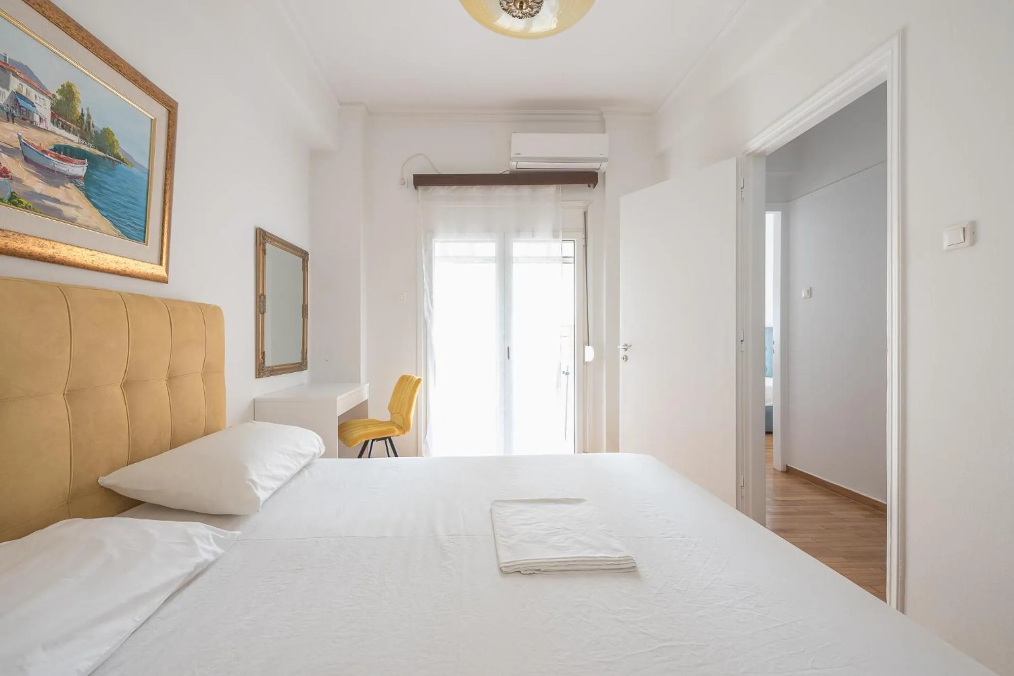 Bed in Victoria Secret Apartments