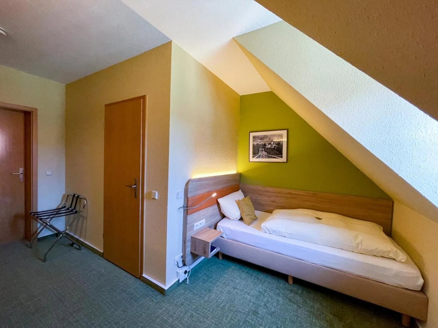 Photo of the whole room, Bed in Altstadthotel "Garni" Grimma
