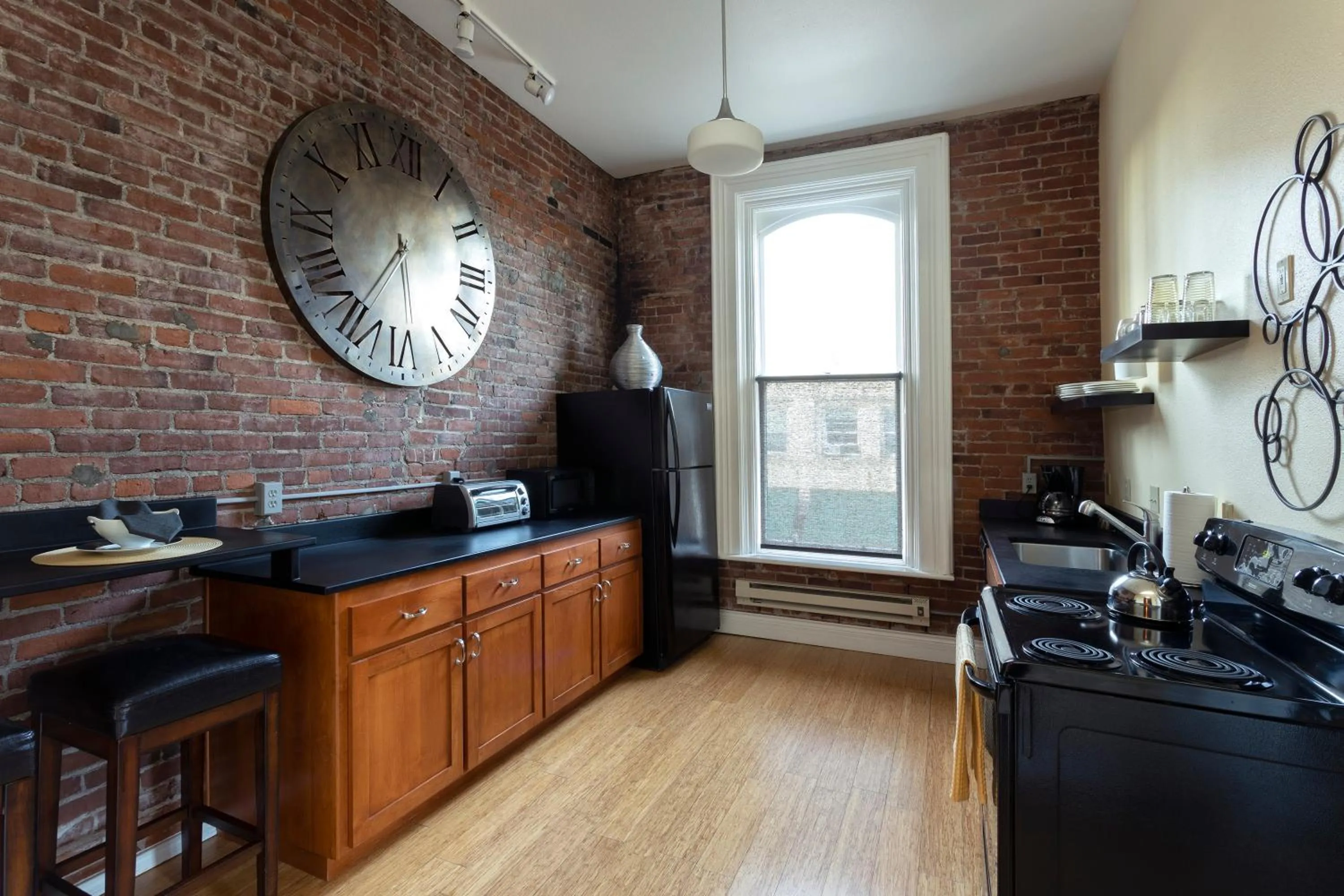 Kitchen or kitchenette in 3rd Street Flats